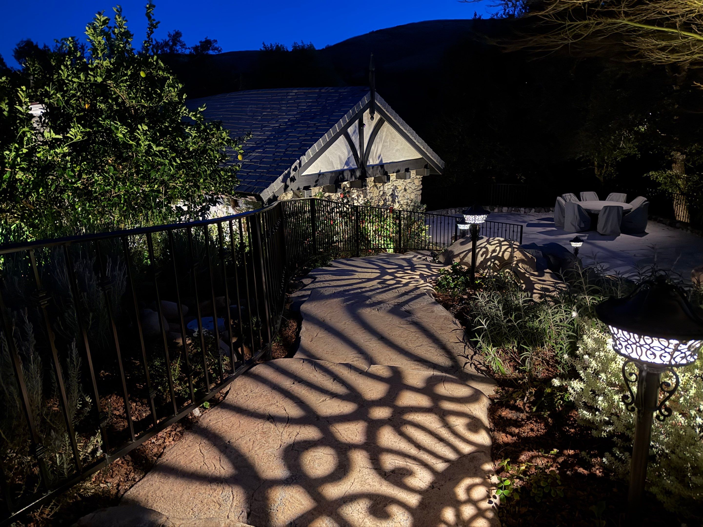 Tudor Estate Landscape Lighting with Integrated Stone Step Illumination by Outdoor Lights + Shades