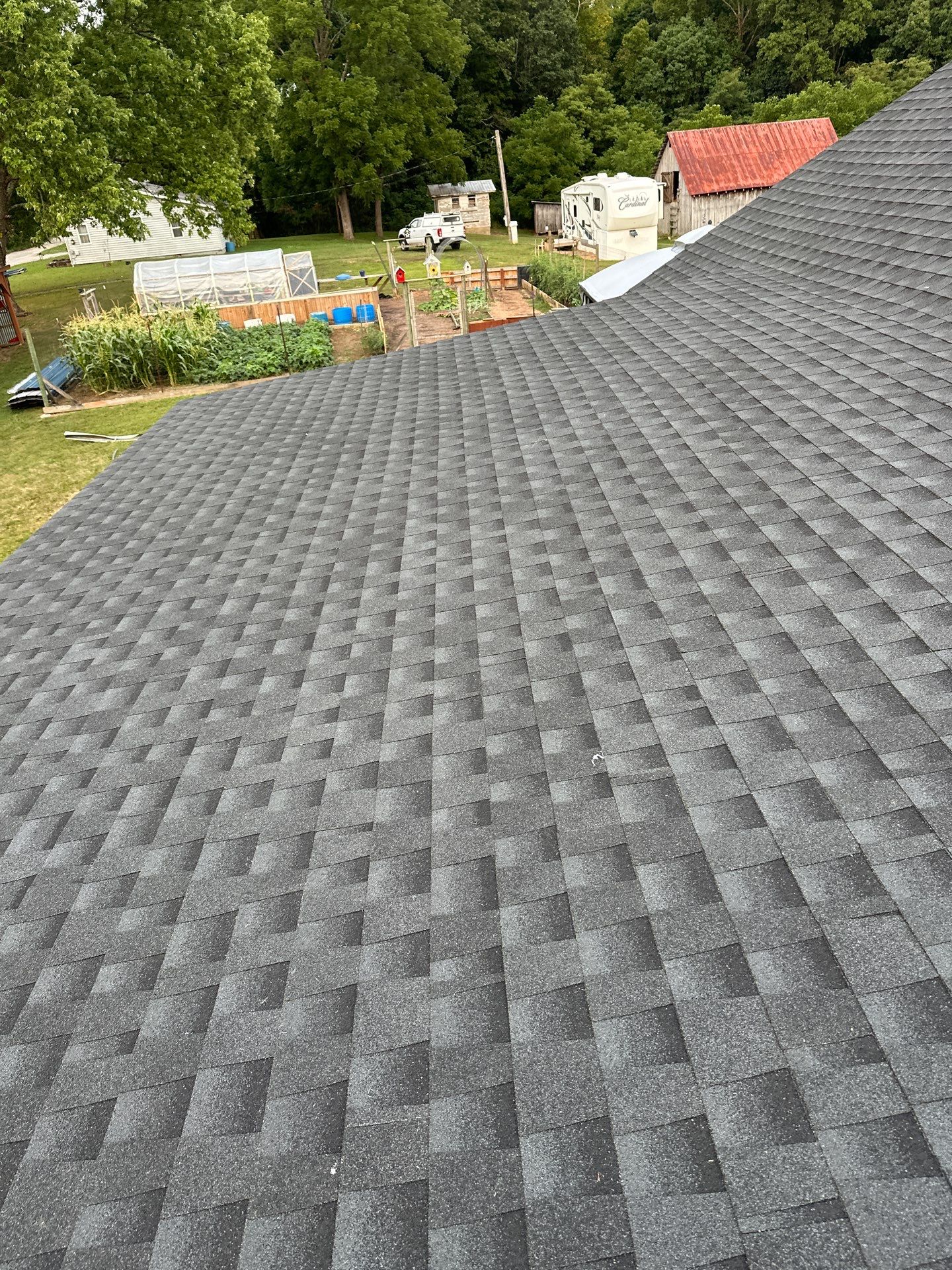 Residential Roofing Installation using GAF Timberline HDZ Charcoal by Rainstoppers Roofing
