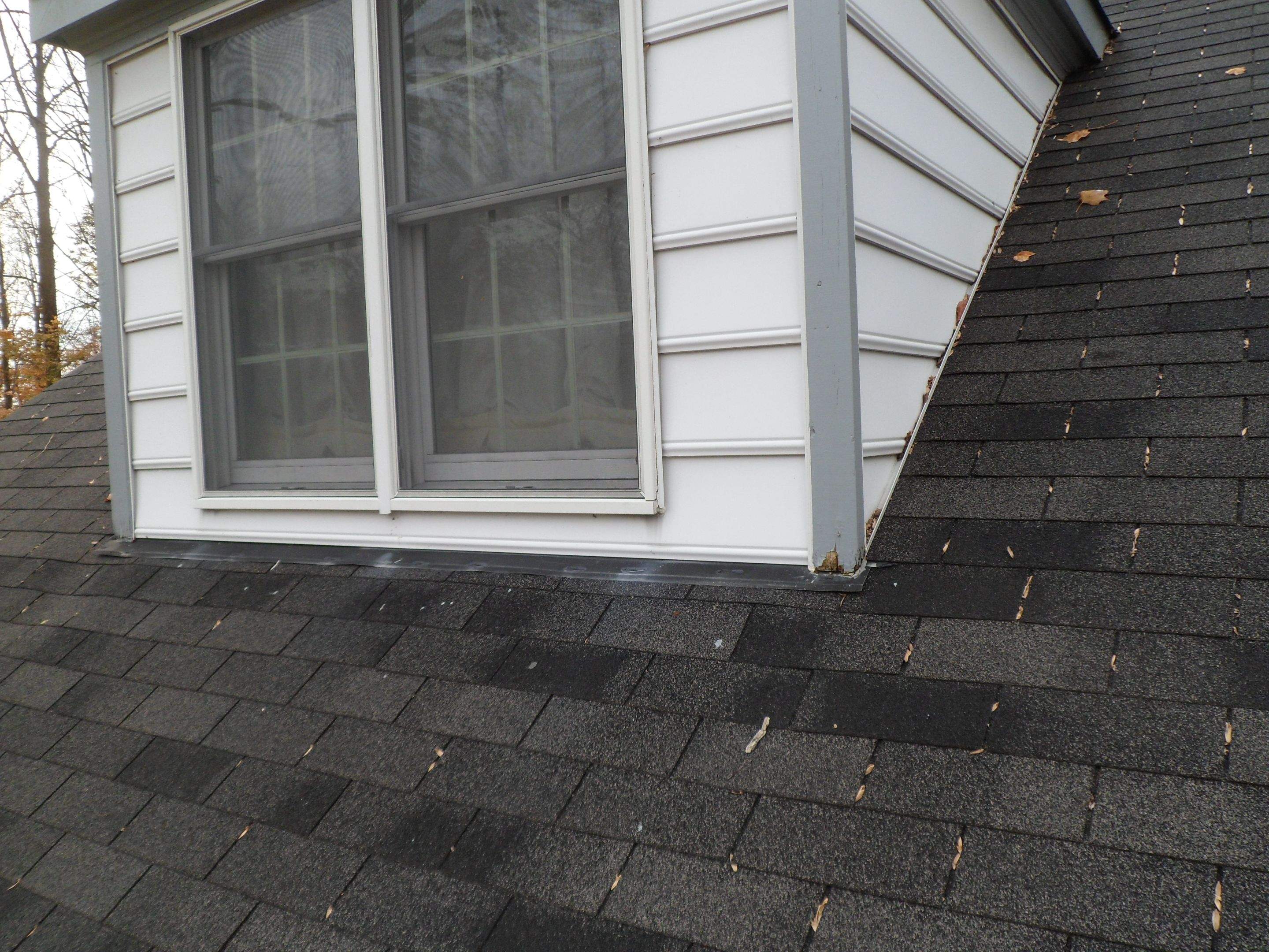 Residential Roofing Installation using Charcoal Black by Alpha Design Services
