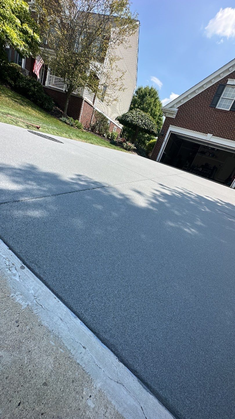 Pool Deck + Driveway + Garage Project in Venetia by Floors in a Day, Inc