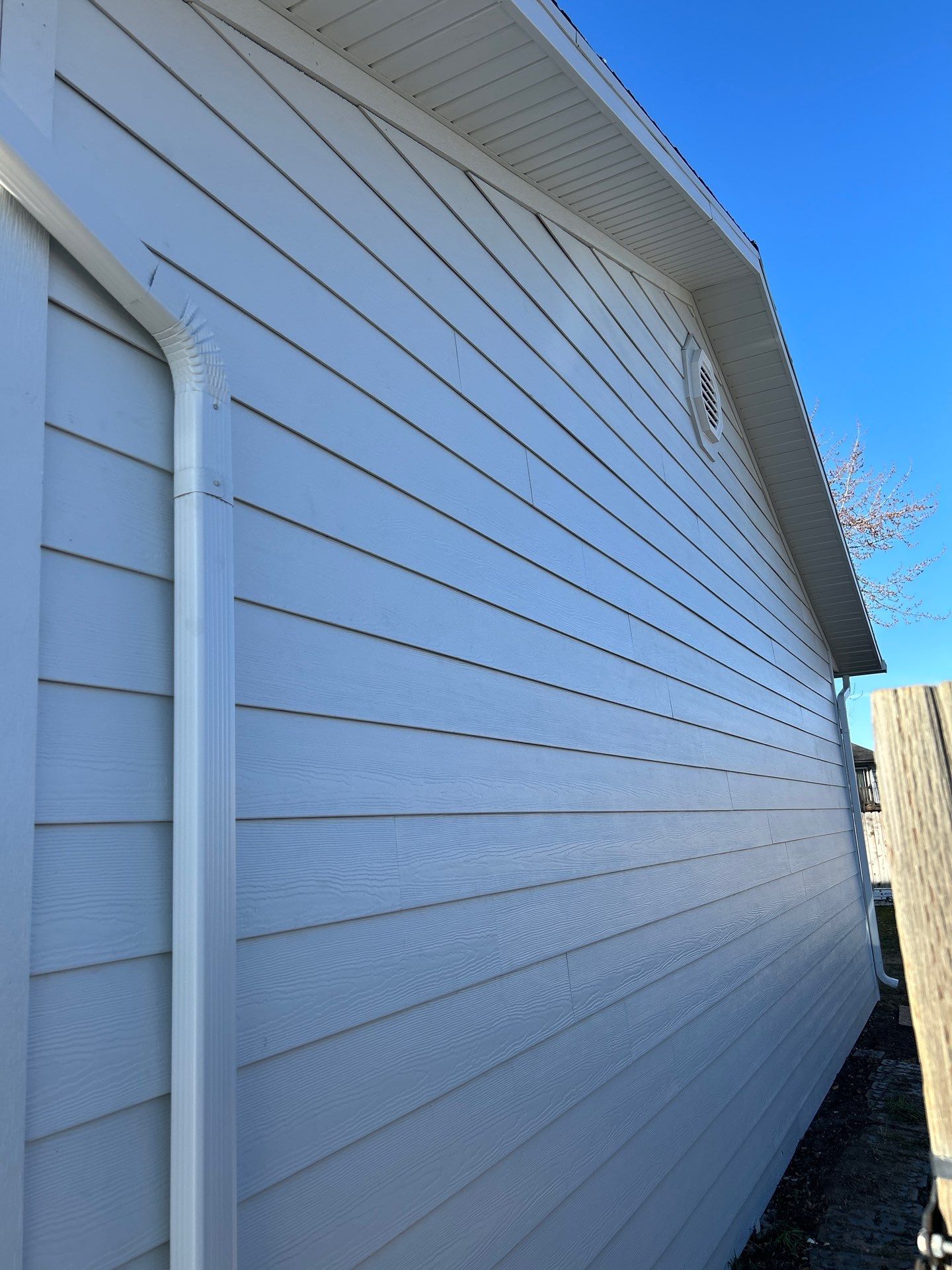 Orem | Crisp Monochromatic Hardie Upgrade | Arctic White by Ideal Siding Utah