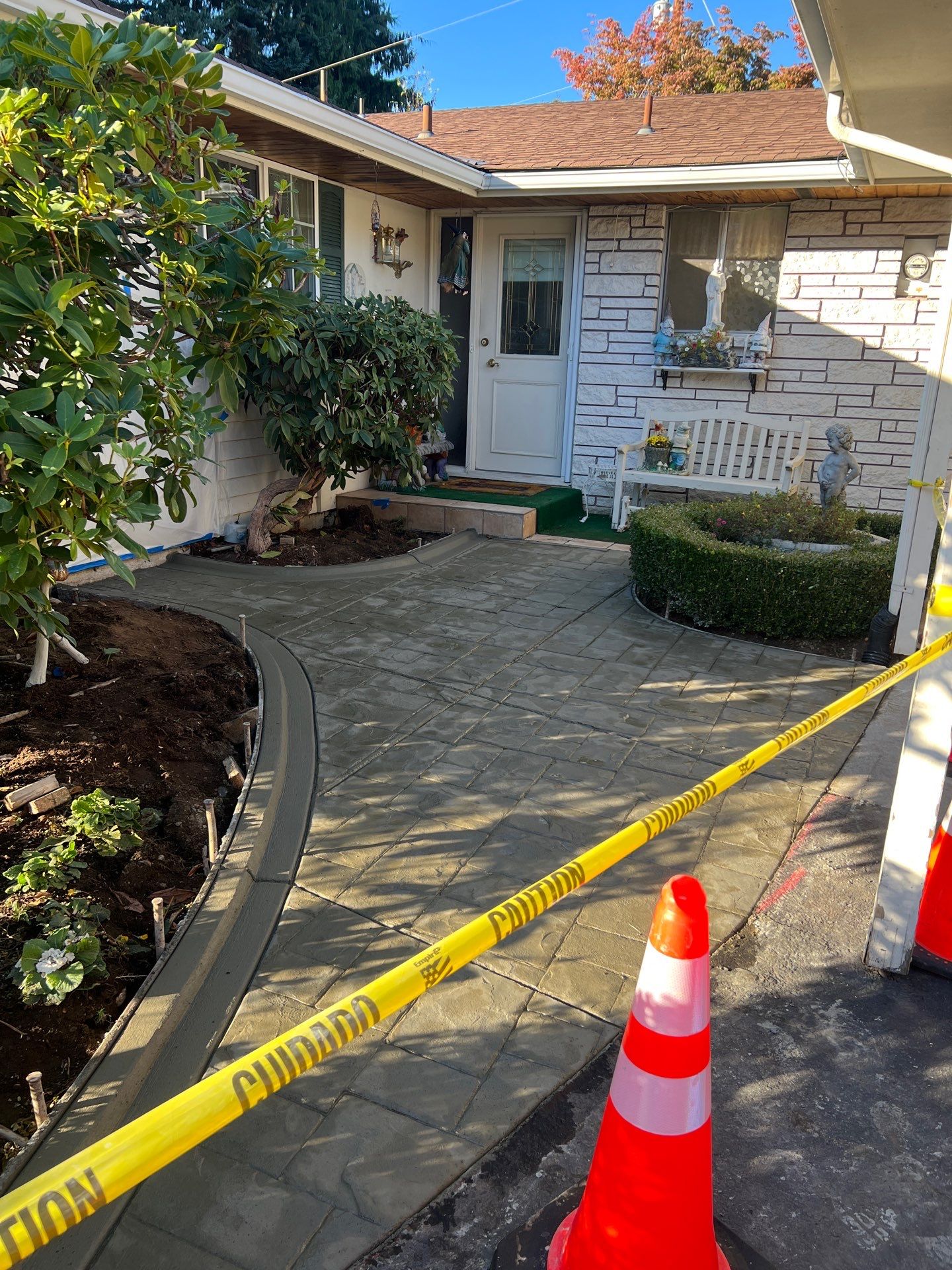 Gisela | Stamped Concrete Walkway  by Jireh Asphalt & Concrete Inc 