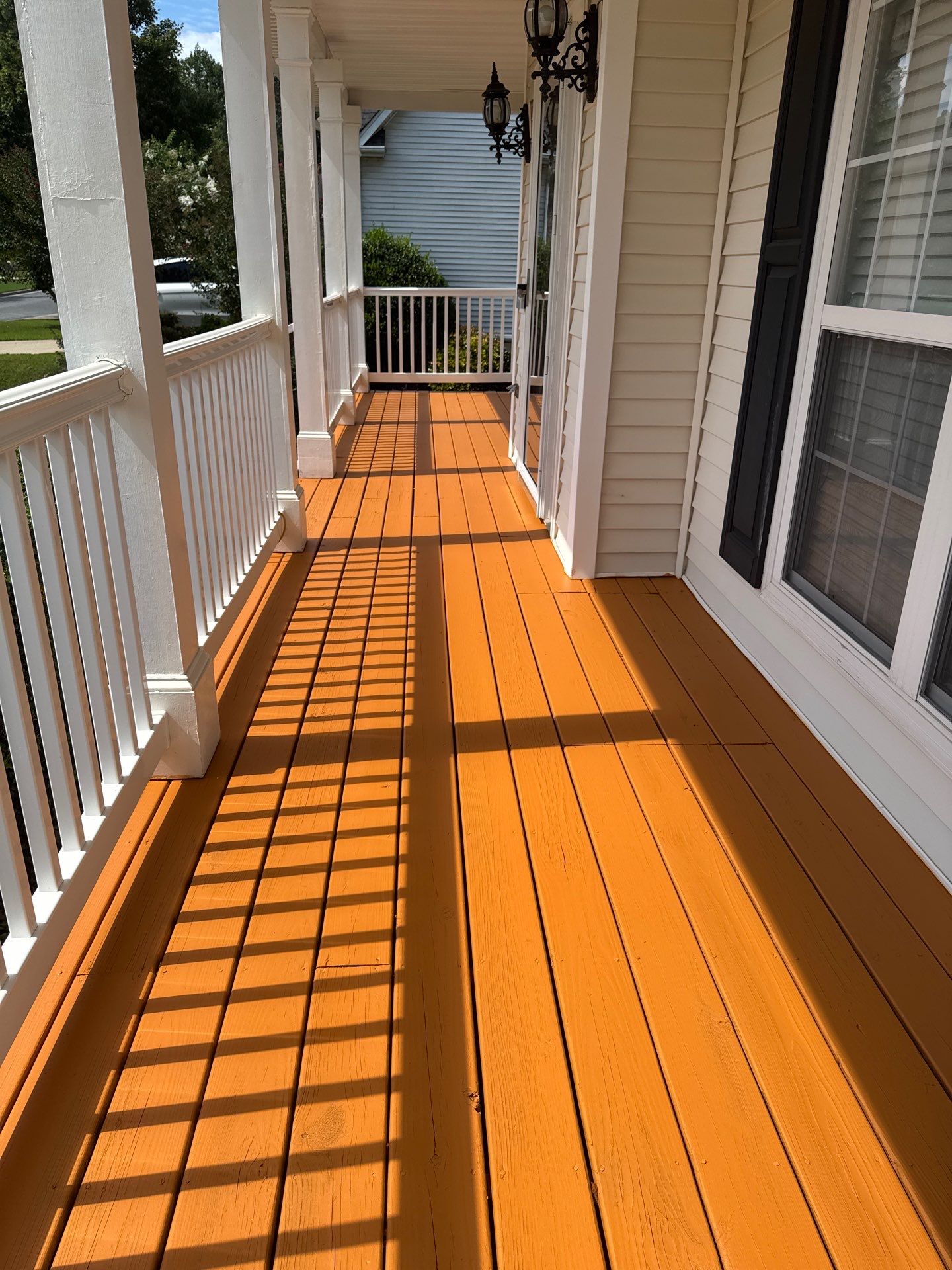 Multi-Level Deck and Front Porch Staining in Powder Springs by Swift Home Renovations