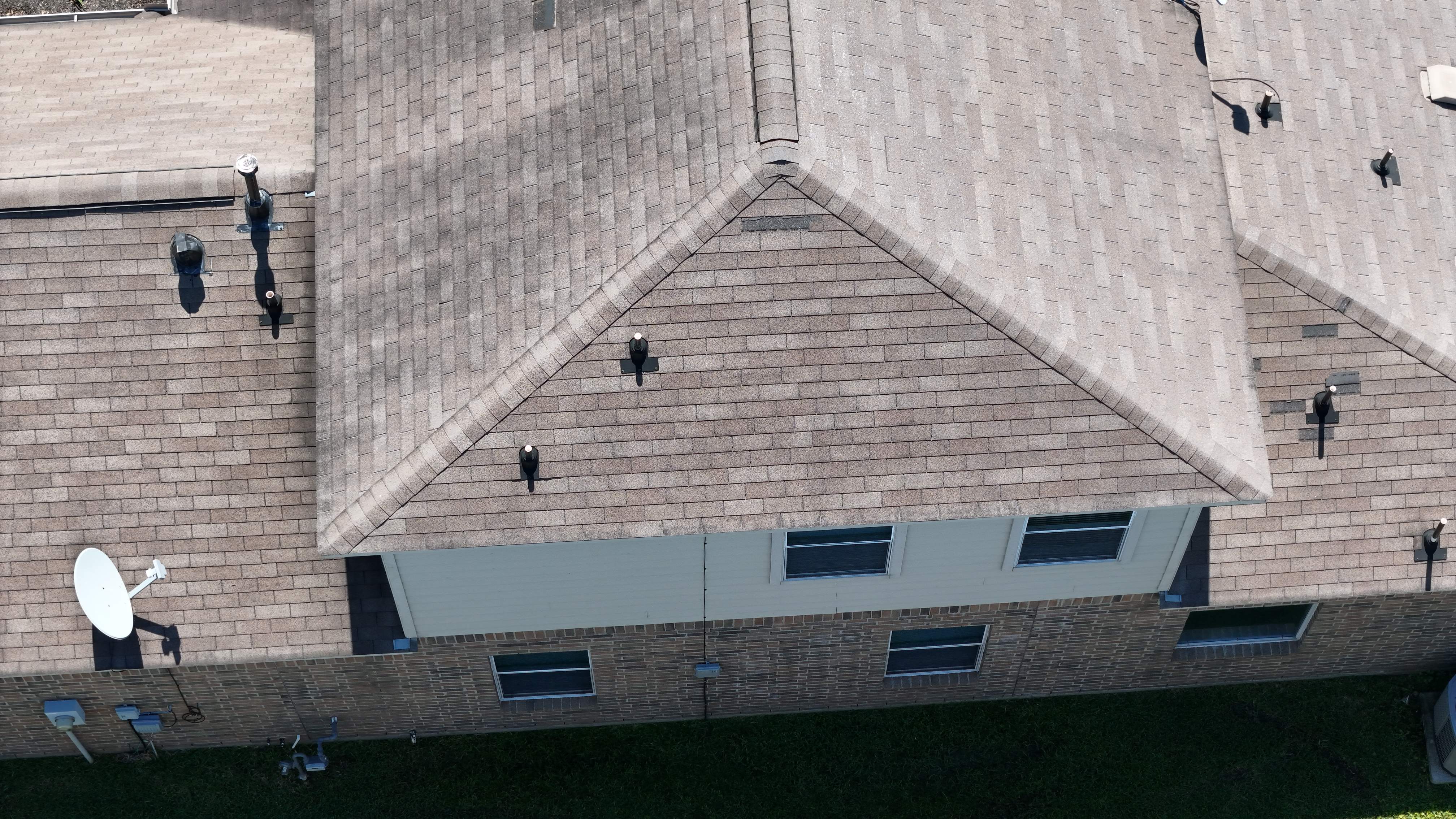 Full Roof Replacement in Warm Brown Tones — Spring, TX by PL Roofing & SB Roofing, LLC.