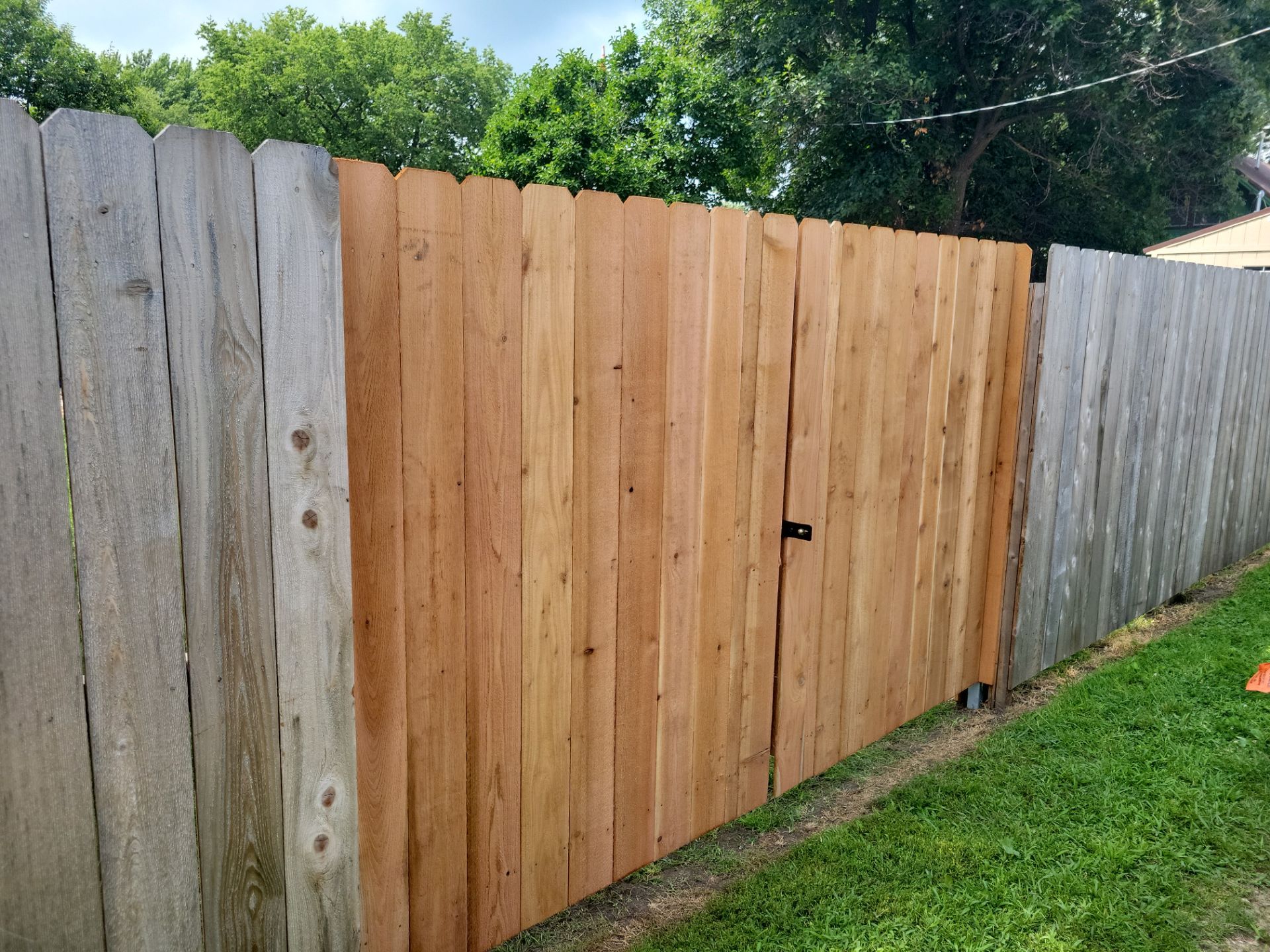 Natural Cedar Wood Privacy Fence and Gate Installation in Clarksville by Perfect Picket Fence and Stain