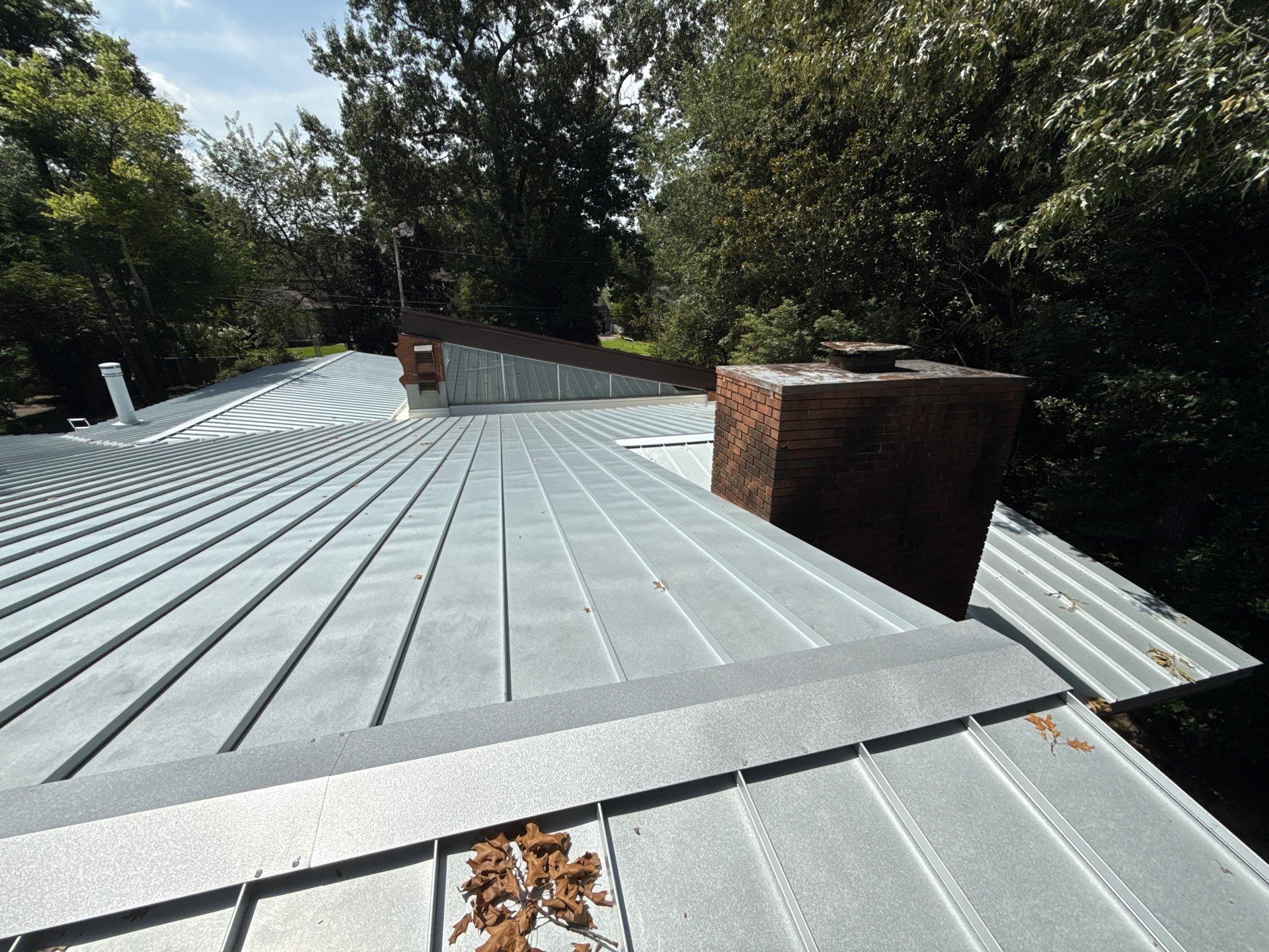 Residential Standing Seam Metal Roof and Membrane Replacement in Memphis by Revival Roofing Services