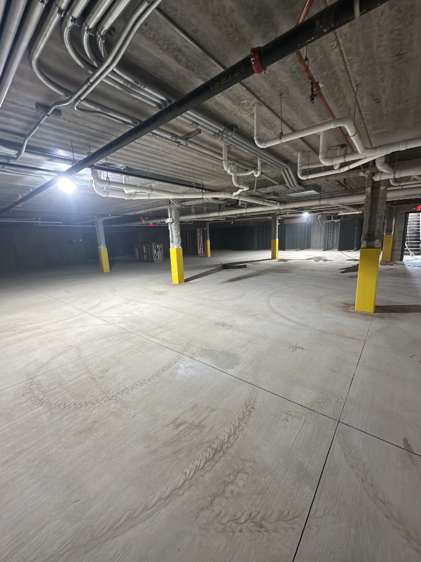 Parking garage post construction cleanup by Northern Power Washing LLC.