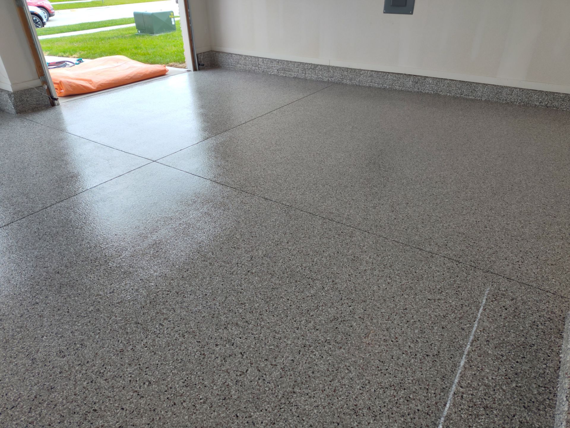 New Bondurant Garage Floor Coating by Revival Concrete Coatings, LLC