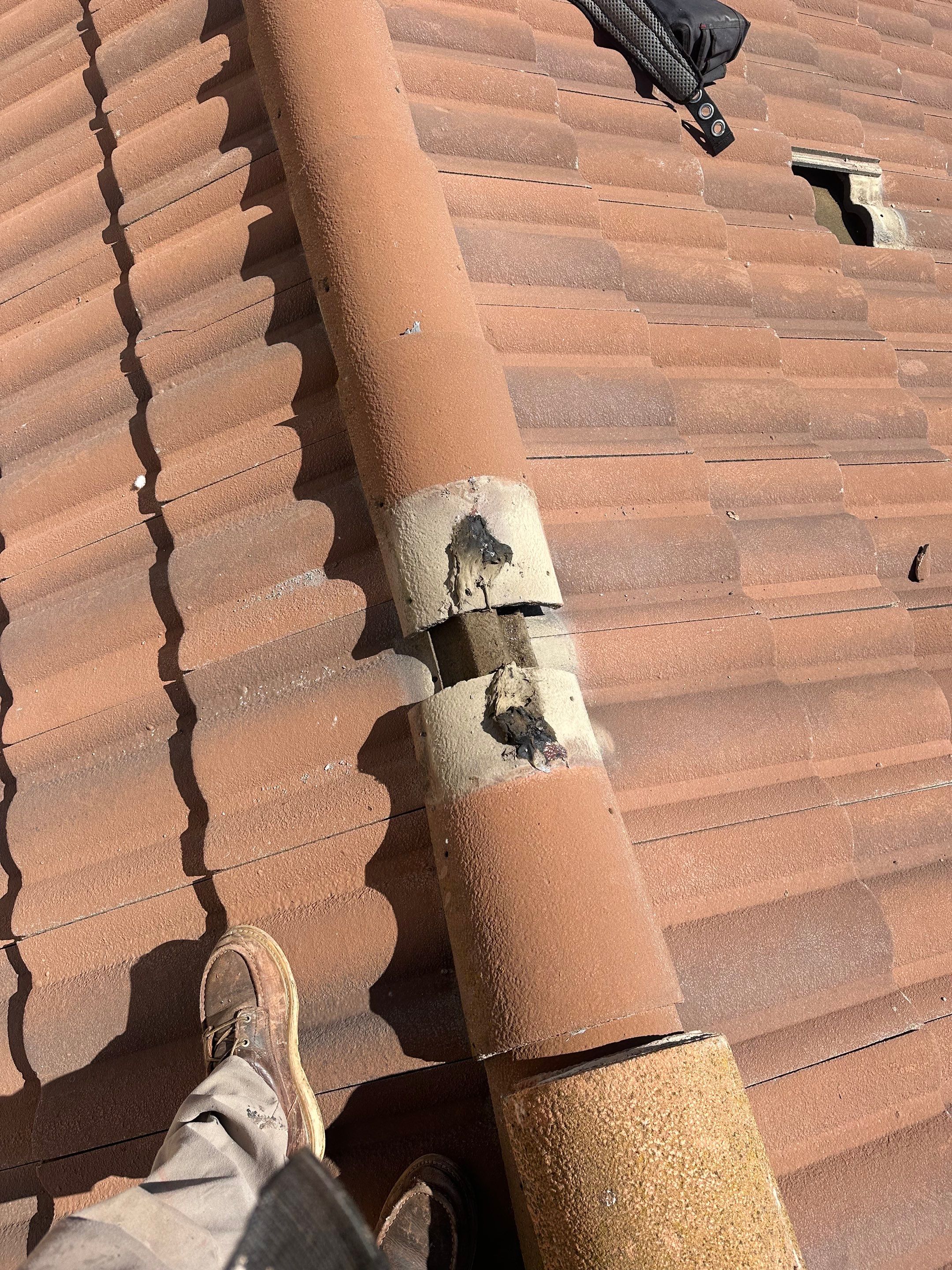 Tile Roof repair by Grandmark Service Company