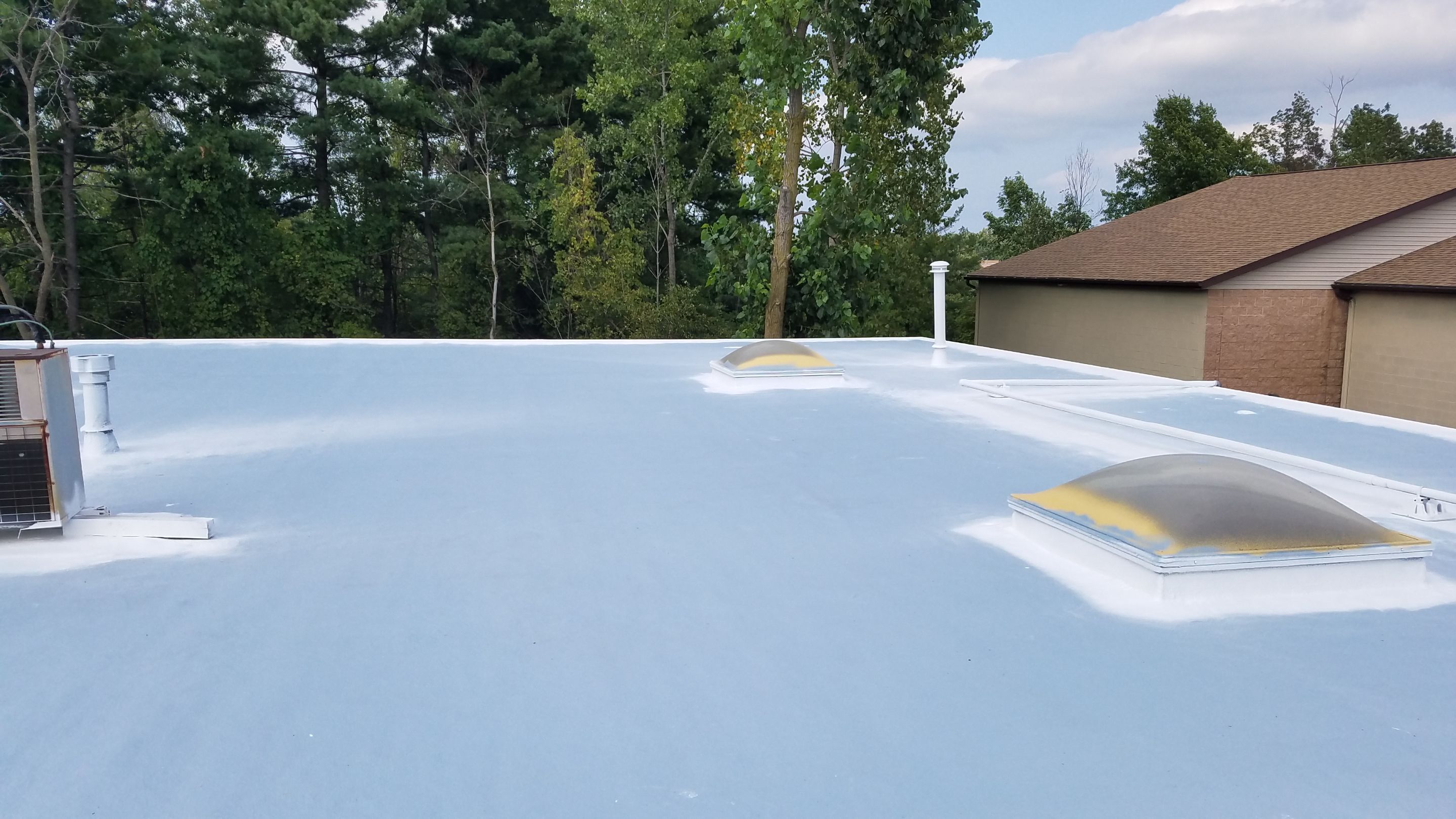 Spray Foam Roof System by Gold Star Roofing LLC 