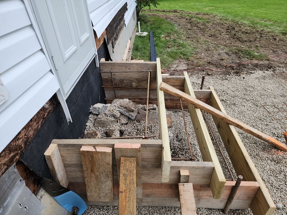 Stamped Concrete and Entry Door by Ivy Lea Construction