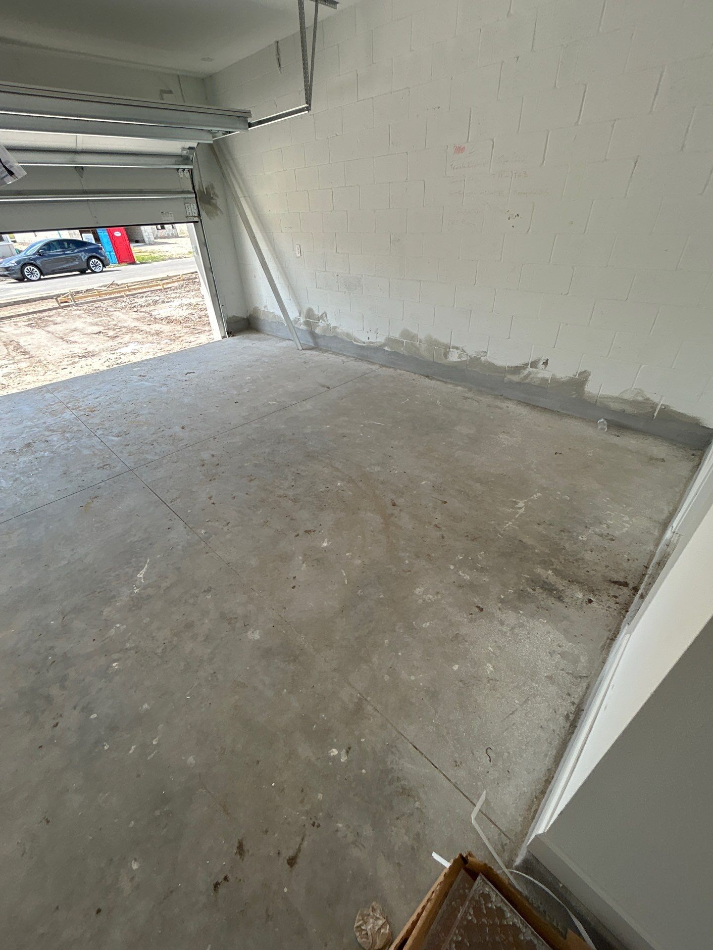 Custom Epoxy Floor Coating for Wesley Chapel Garage by Performance Floors & Coating