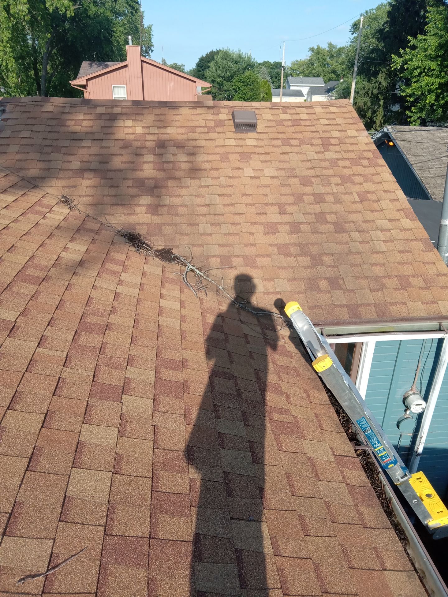 Asphalt Roof Replacement by Custom Installations