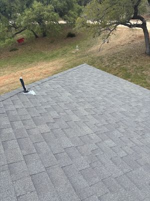 High angle view of a completed architectural asphalt shingle roof.