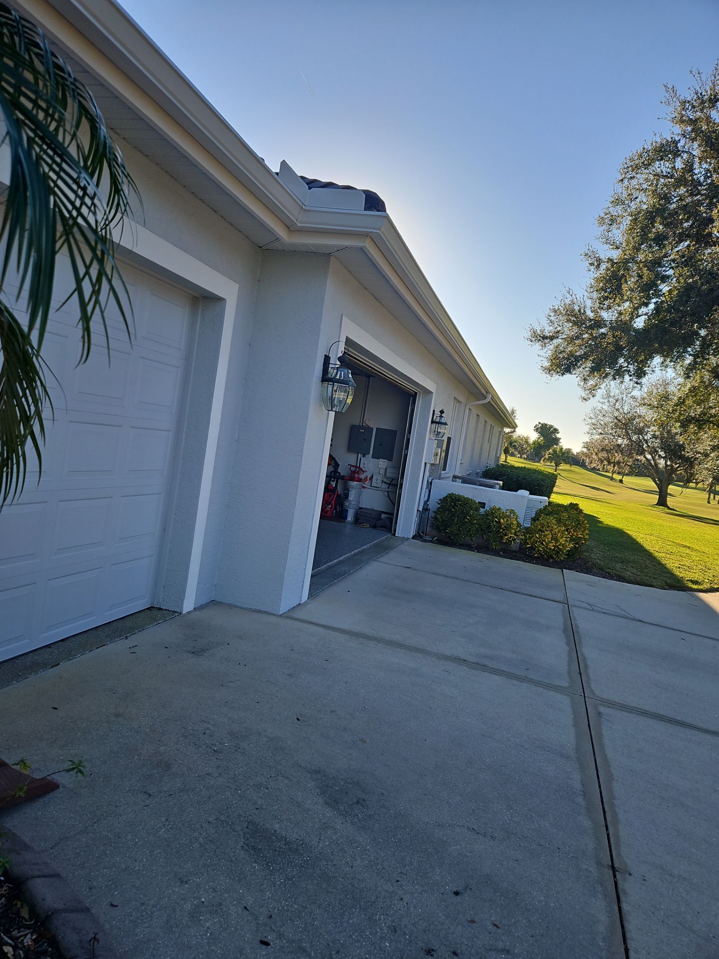 White Down Spouts using downspouts and White Seamless Gutters in Sarasota FL by Gutter Professors
