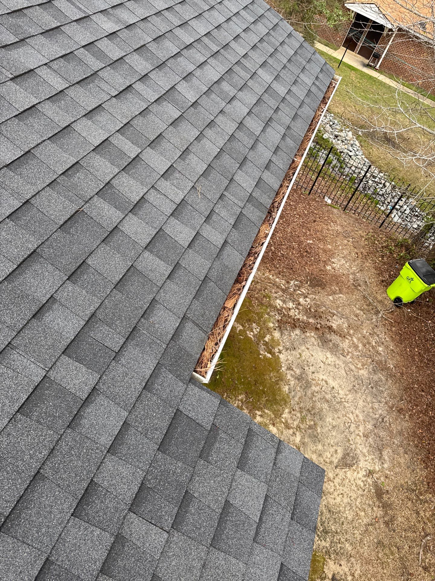 HOA gutter cleaning in Pinehurst & Southern Pines, NC,before photo showing full gutters.