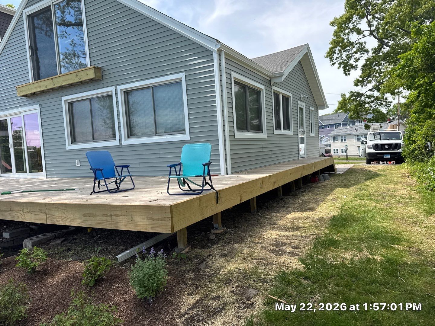 Milford Exterior Renovation Featuring Custom Siding and Wood Deck Installation by A Plus Exterior