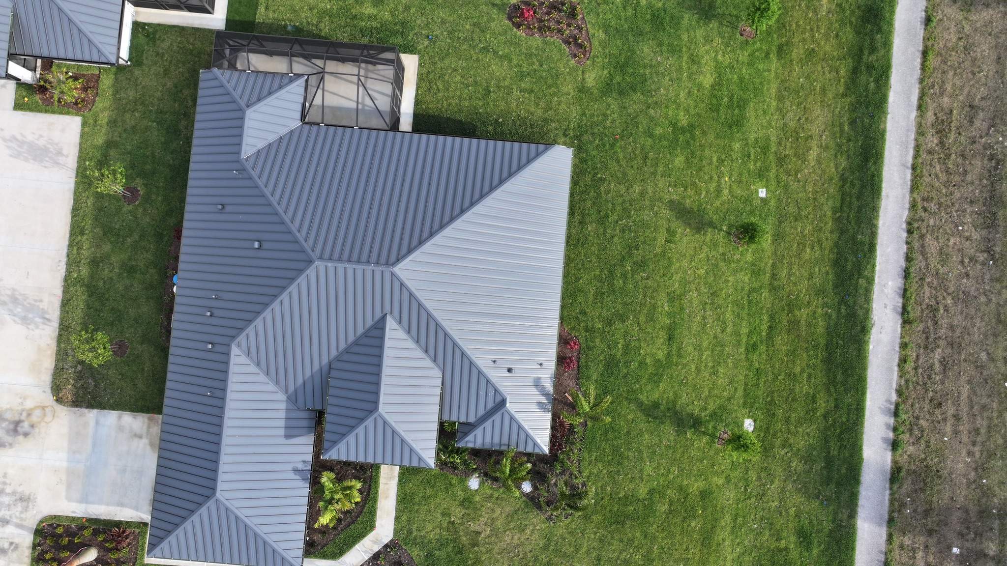24ga 1.5 Mechanical Seam Charcoal Gray  by Total Roofing System The Metal Roof Experts