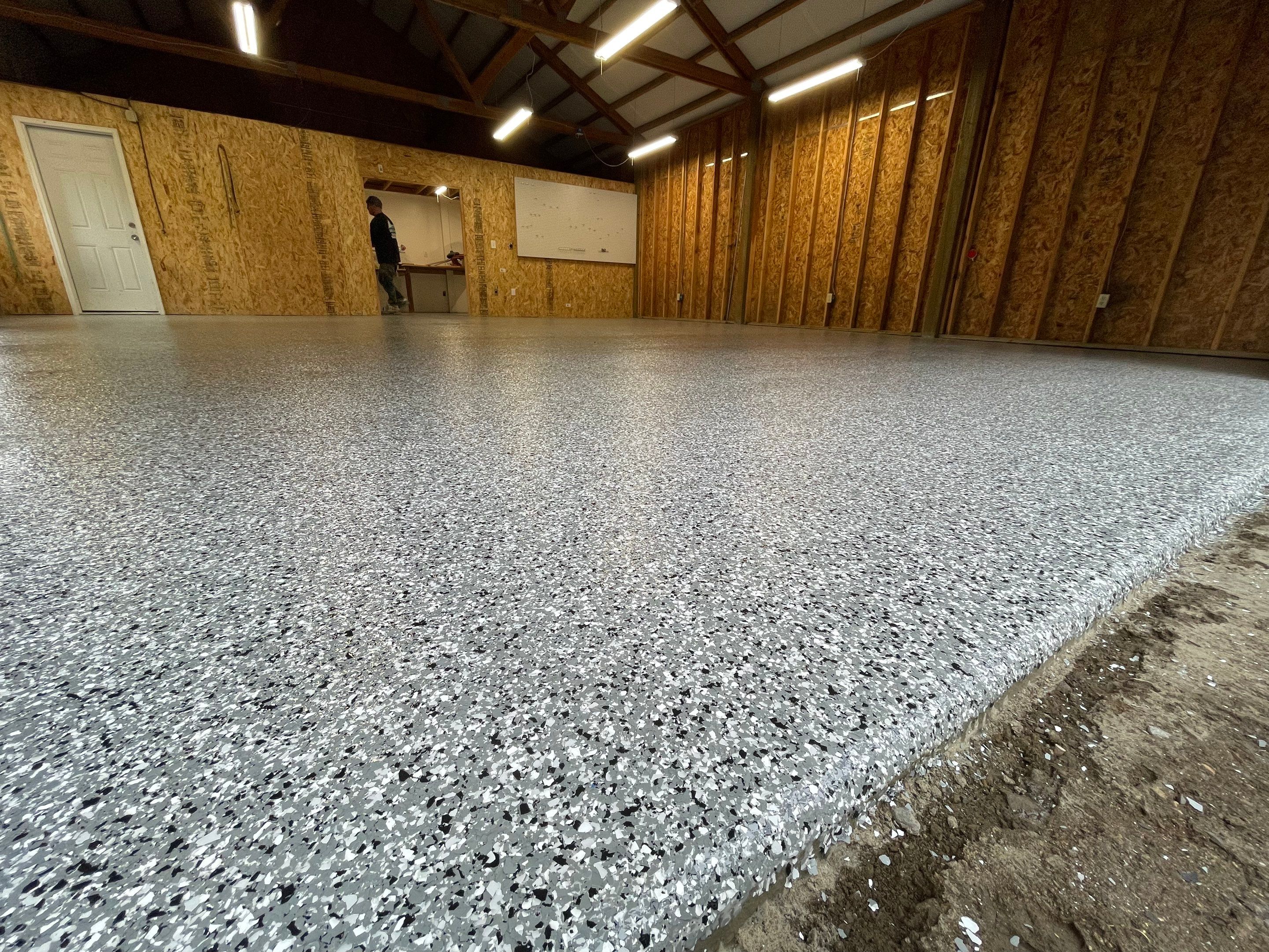 Garage Transformation using Penntek Evolution System and Smoke Color by Croc Coatings, LLC