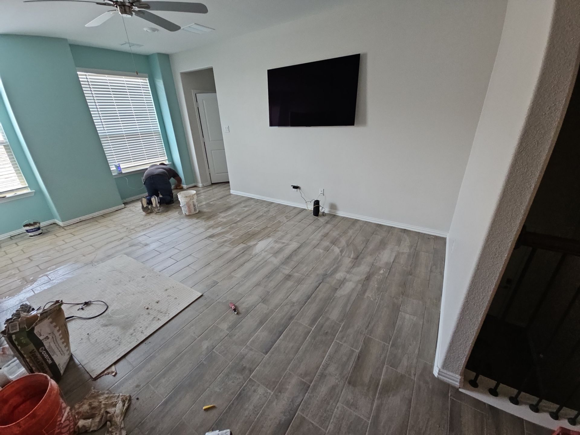 Carpet replacement with Tile and Red Oak Stairs by EL-GC LLC 