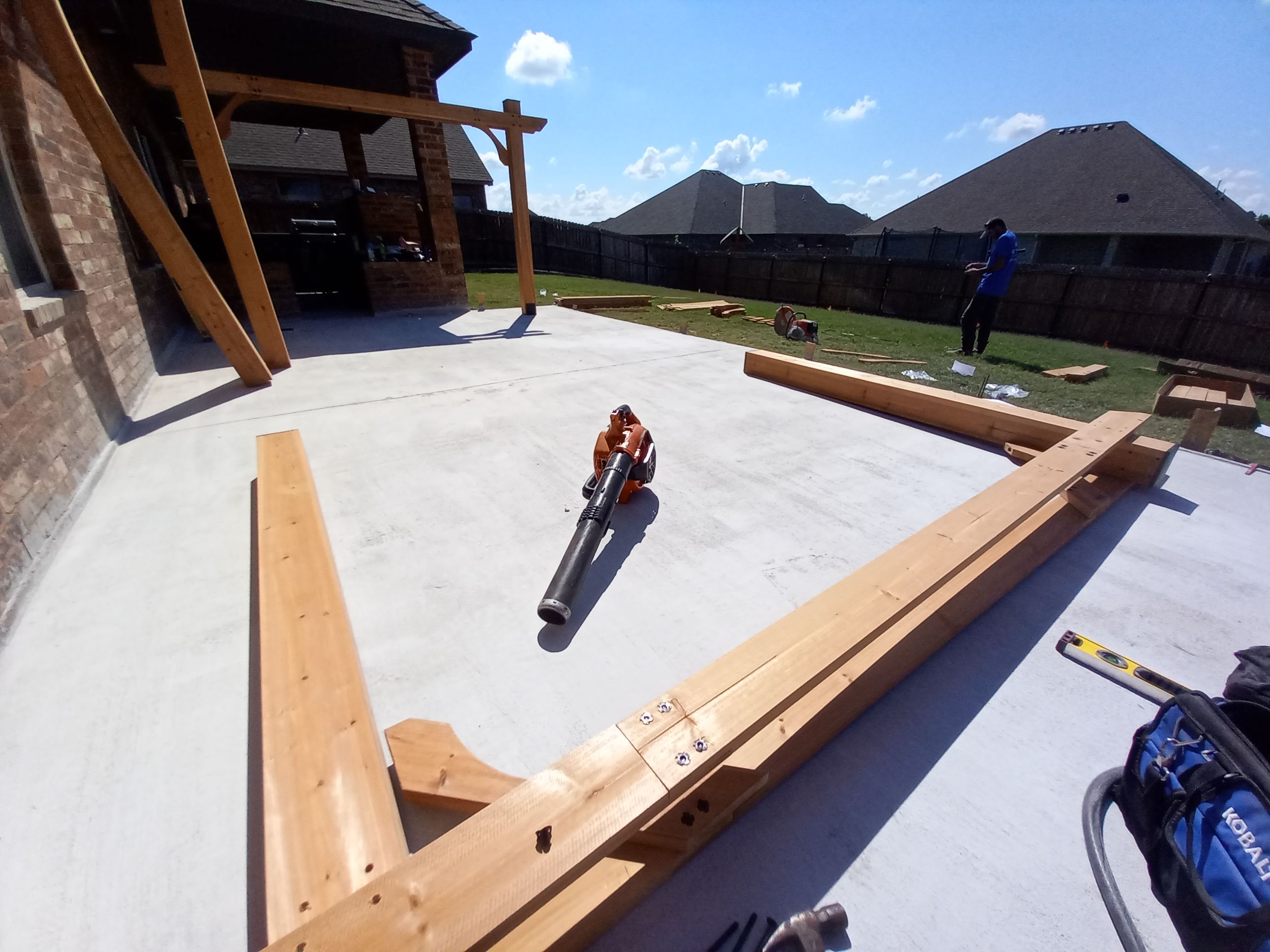 Concrete slab with Pergola by Clays Services Inc
