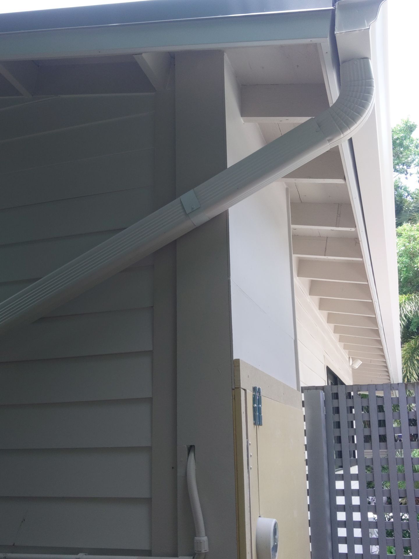 Aluminum Seamless Gutters using 3X4 Elbow Downspout in Sarasota FL by Gutter Professors
