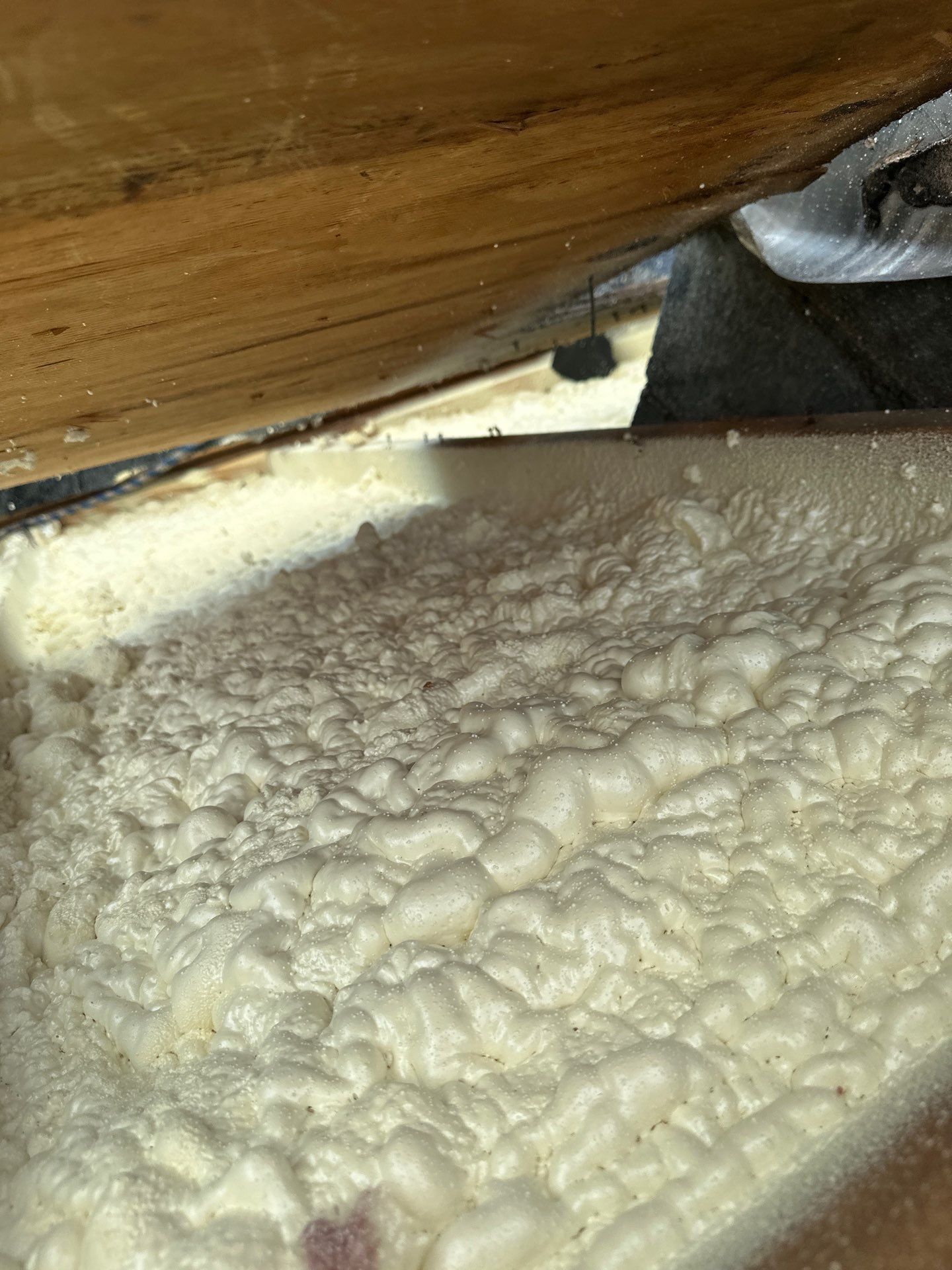 Exterior Installation using Closed Cell Spray Foam by NYS Foam & Energy