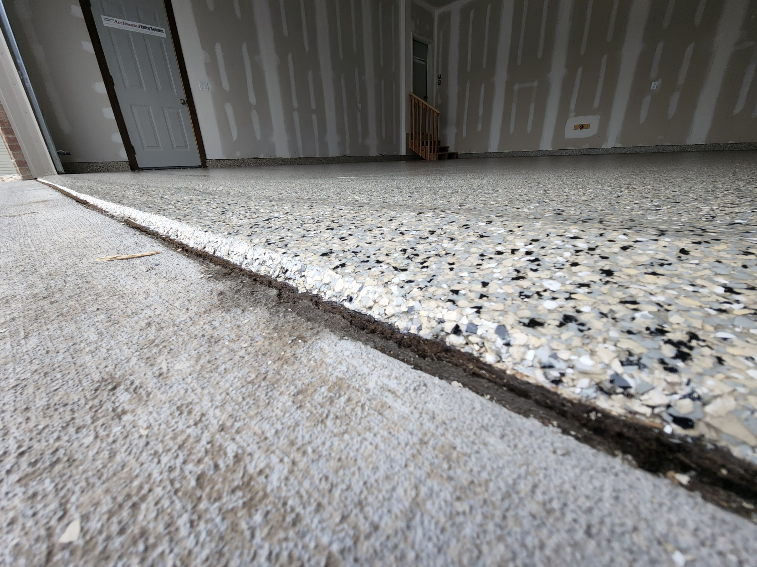 Garage using Mediterranean by Select Painting, Coatings & Garage Cabinets