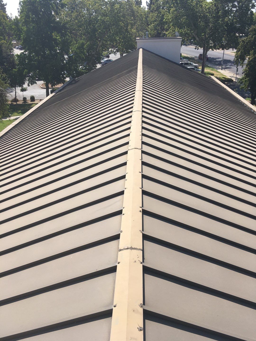 Spray foam and coatings inside commercial building HVAC well using Spray foam and coatings over existing BUR system by Straight Edge Roofing Inc