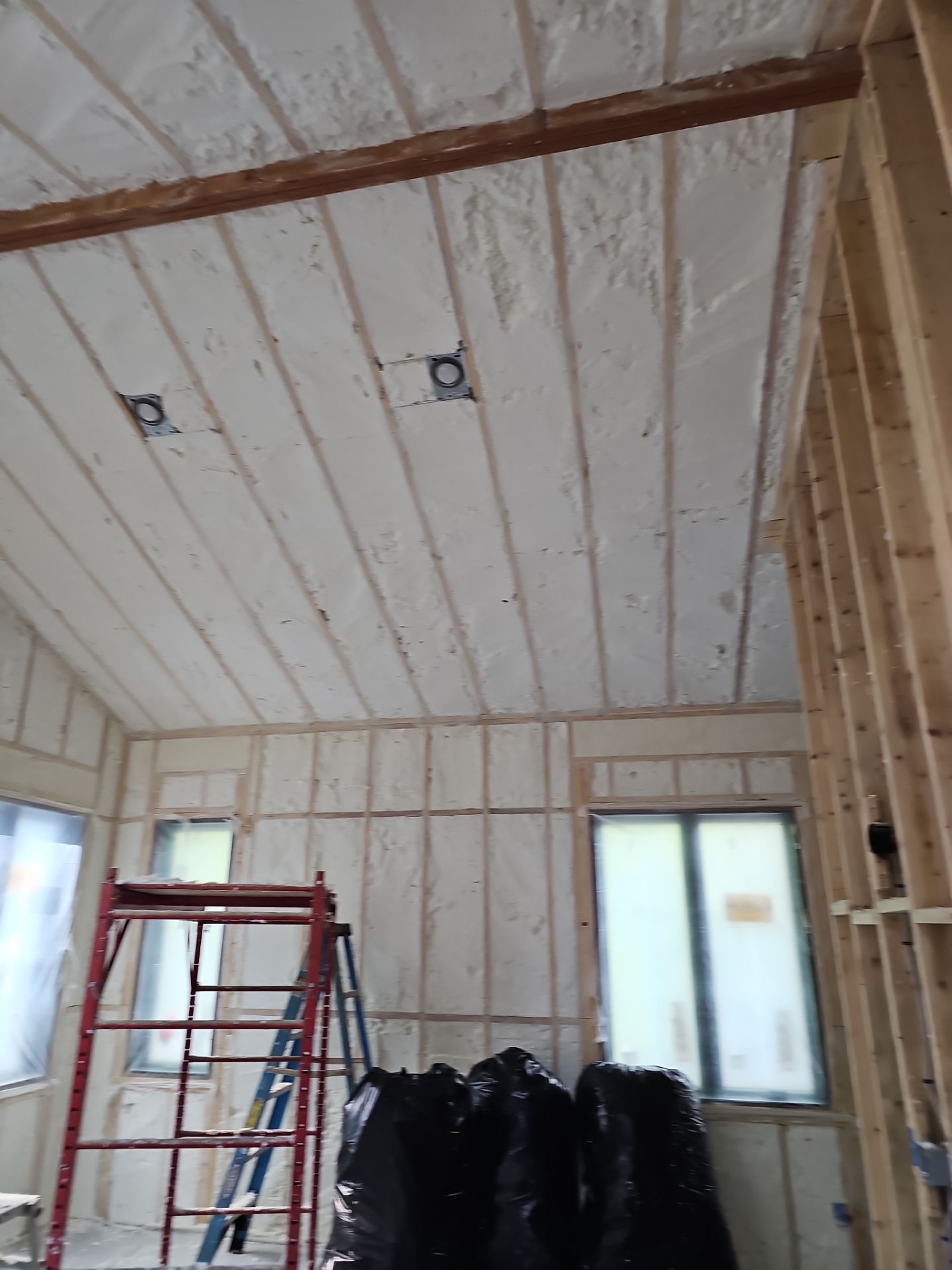 Spray Foam Insulation using open cell spray foam by NYS Foam & Energy