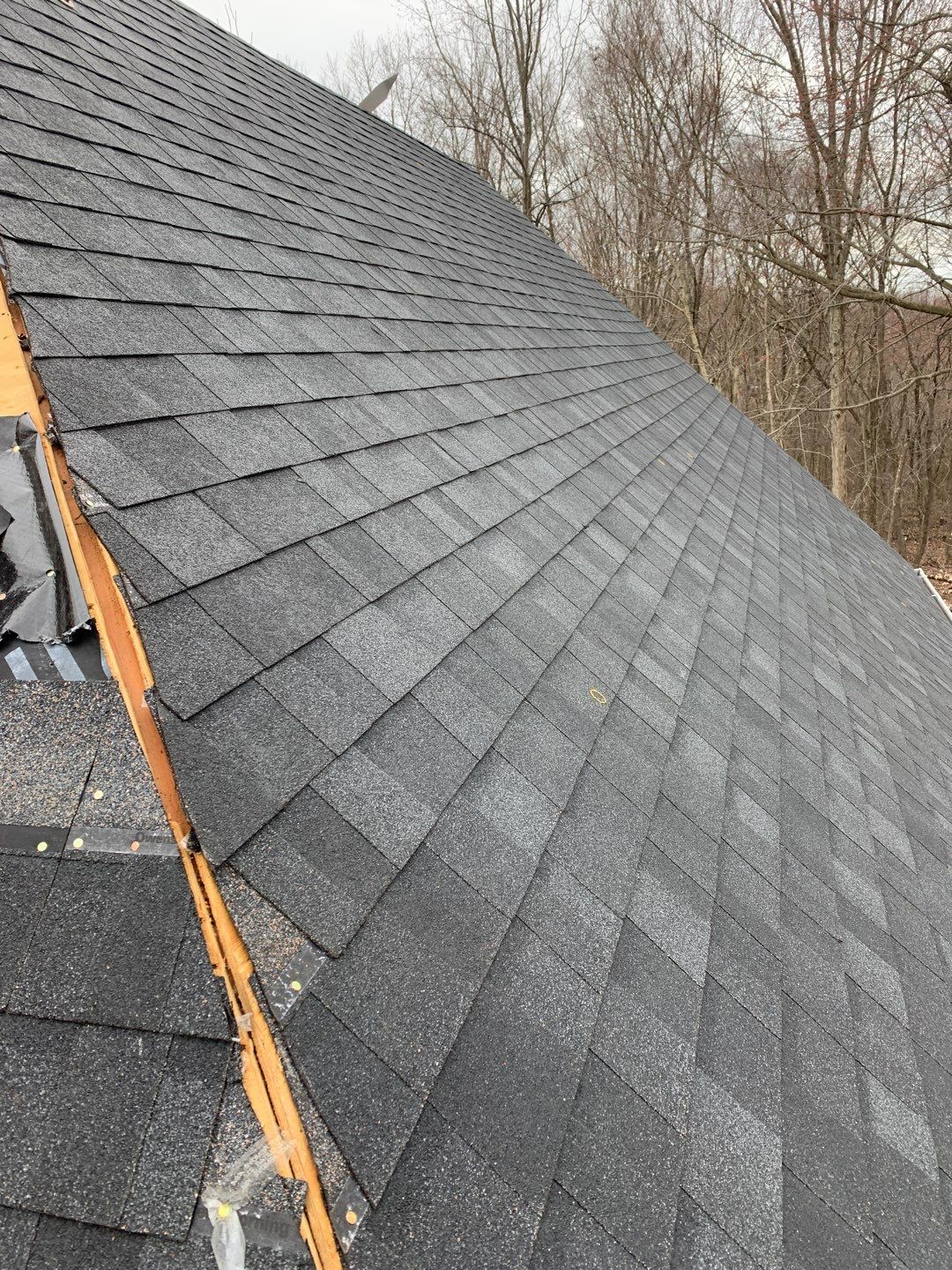 Residential Roofing Installation using Owens Corning TruDefinition Onyx Black by A Plus Exterior