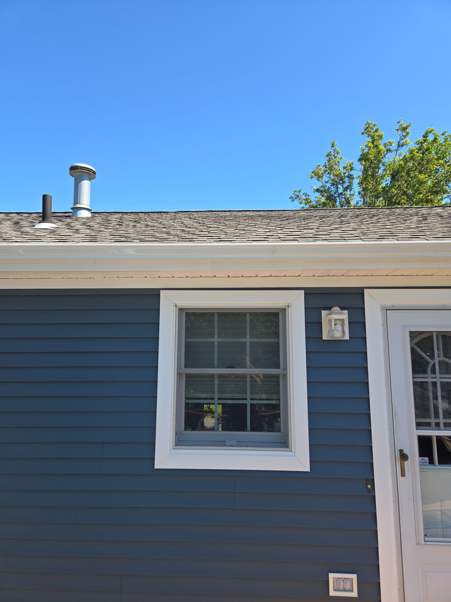 Siding Installation using Certainteed Cedar Impressions Straight Edge Perfection Shingles - D7 - Pacific Blue by A Plus Exterior