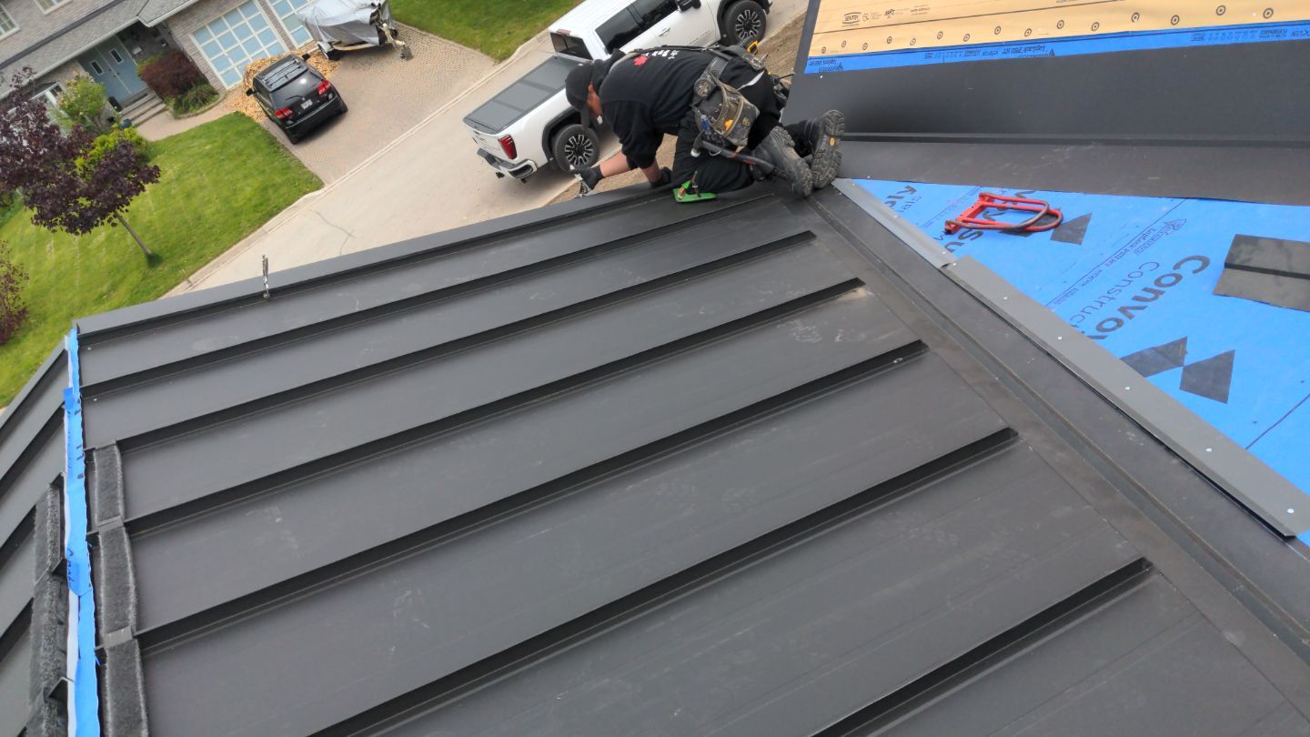 Residential Roofing Installation using 16" Standing Seam Panels by Jay Carter Roofing & Sheet Metal