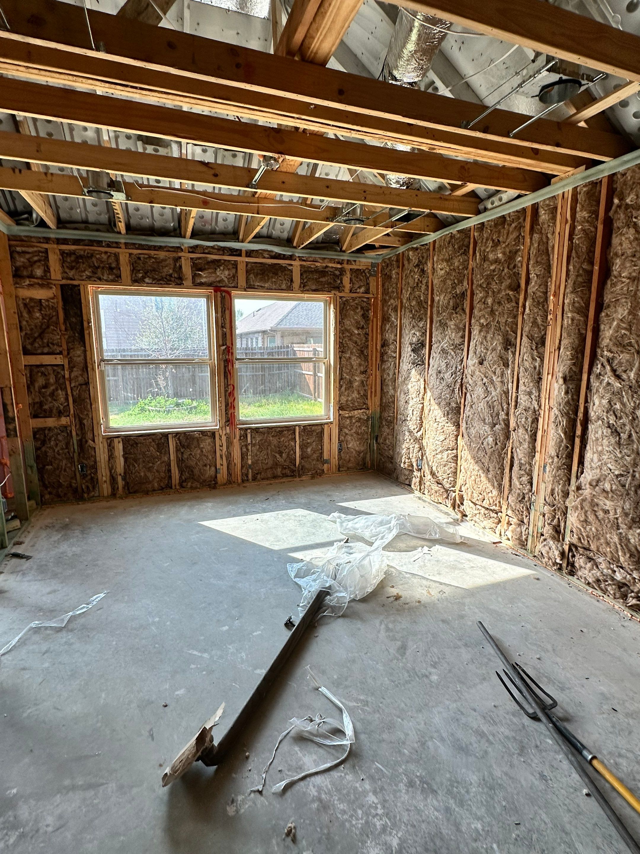 Fiberglass batt install on new construction home in Ft Worth by Apex Insulation Solutions