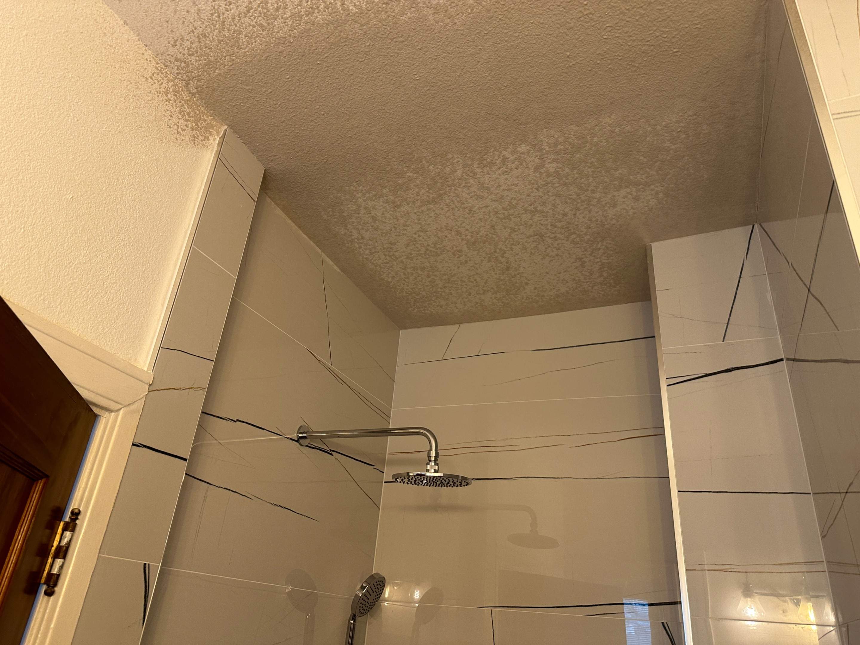 San Antonio Kitchen and Bathroom Remodel Featuring Marble-Patterned Tiles by Mena stone surfaces