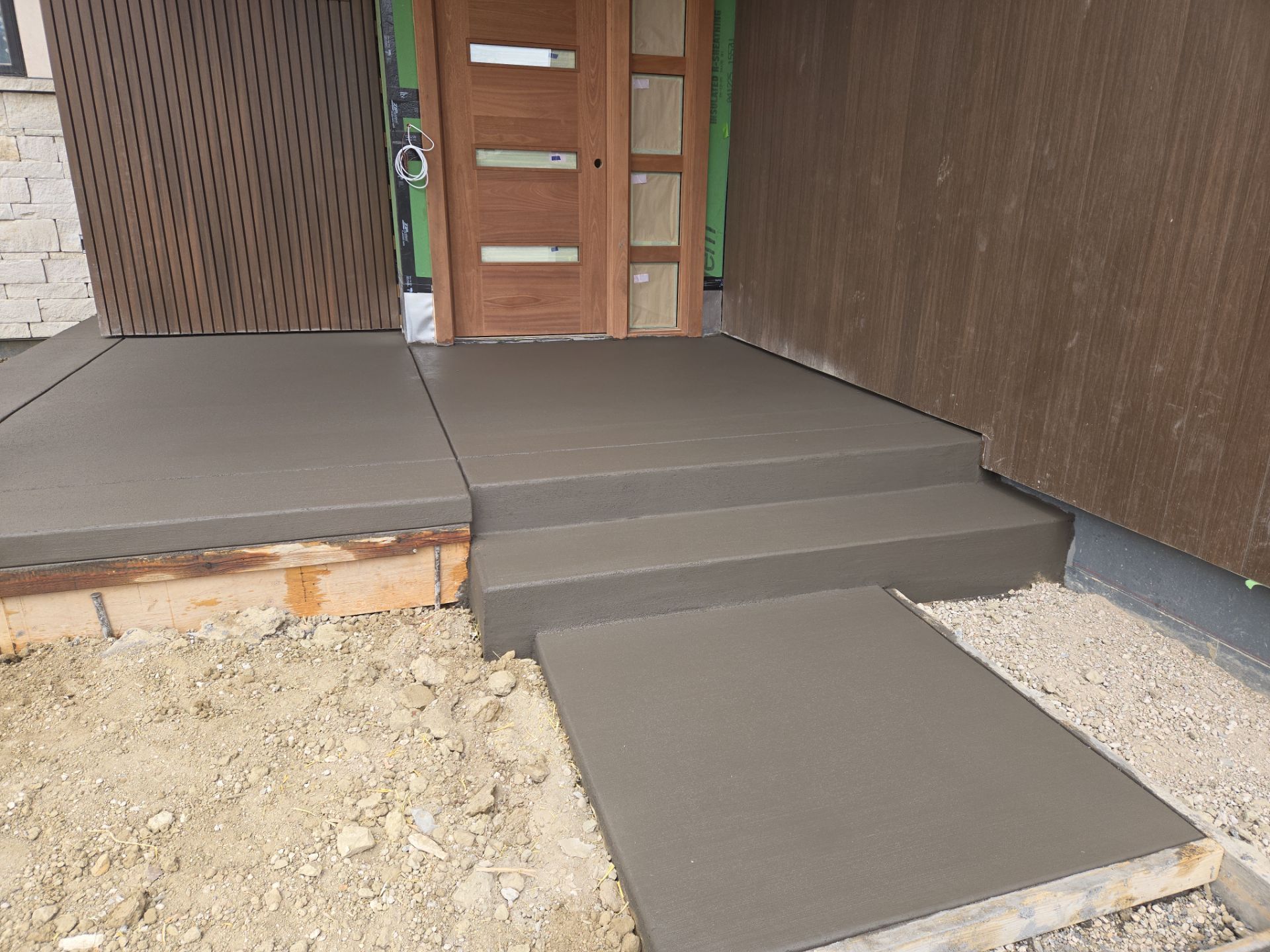 Stamped Concrete Patio and Custom Walkway Installation in Berthoud, Colorado by Center Line Concrete