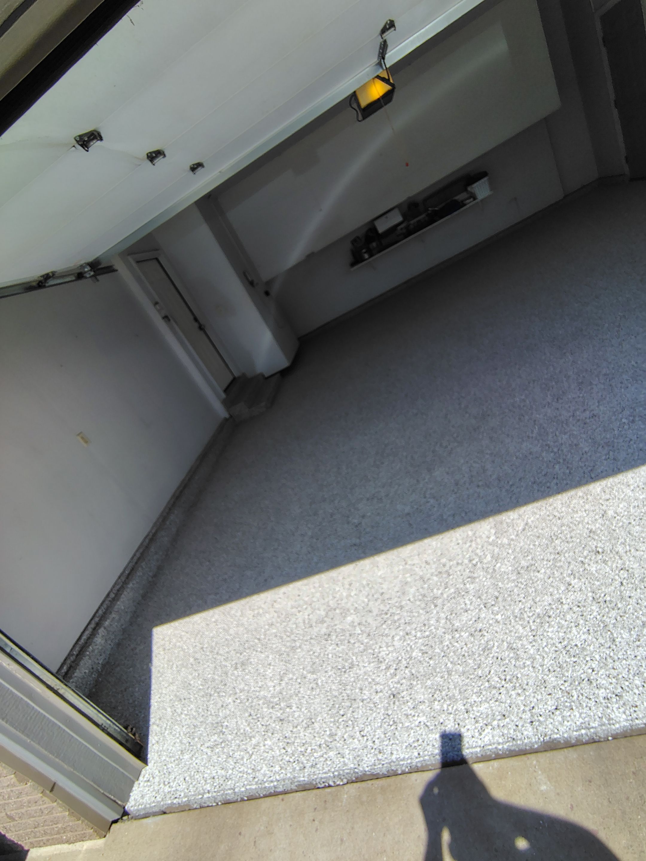Decorative Chip Epoxy Garage Floor Coating in Sioux Falls by Select Painting, Coatings & Garage Cabinets