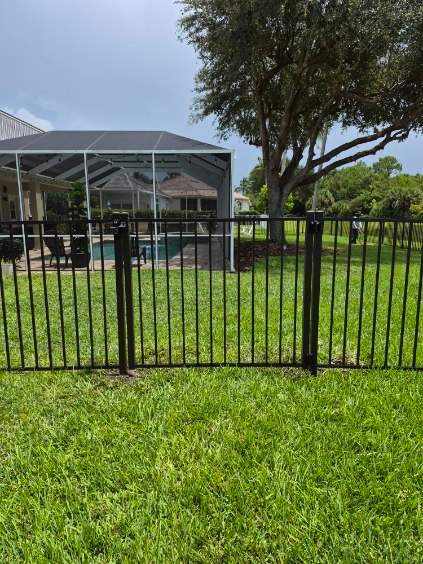 Bronze Aluminum Perimeter Fence Installation in Fort Myers by True Fence LLC