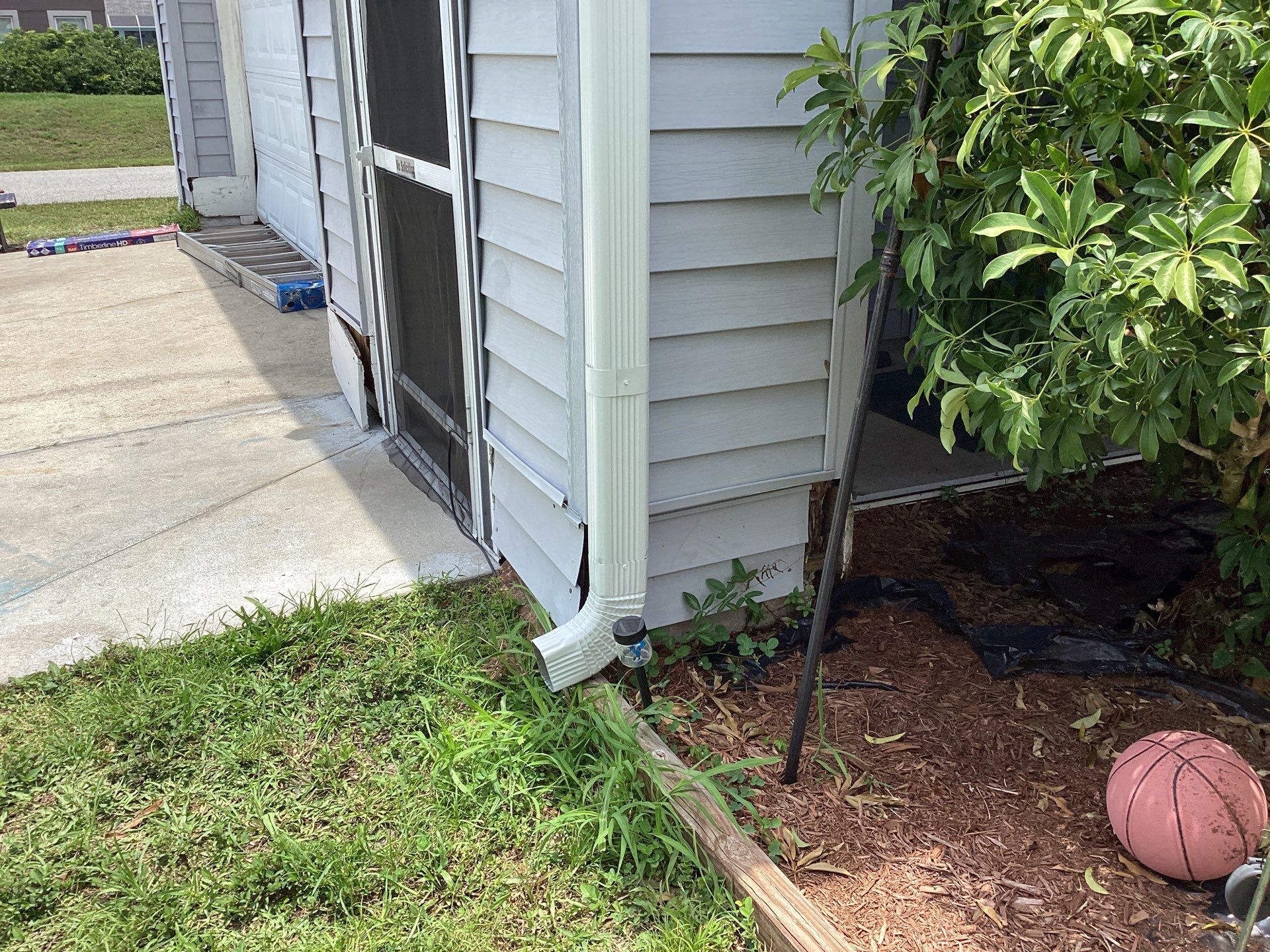 Aluminum Seamless Gutters using Splash Guard in Cape Coral FL by Gutter Professors