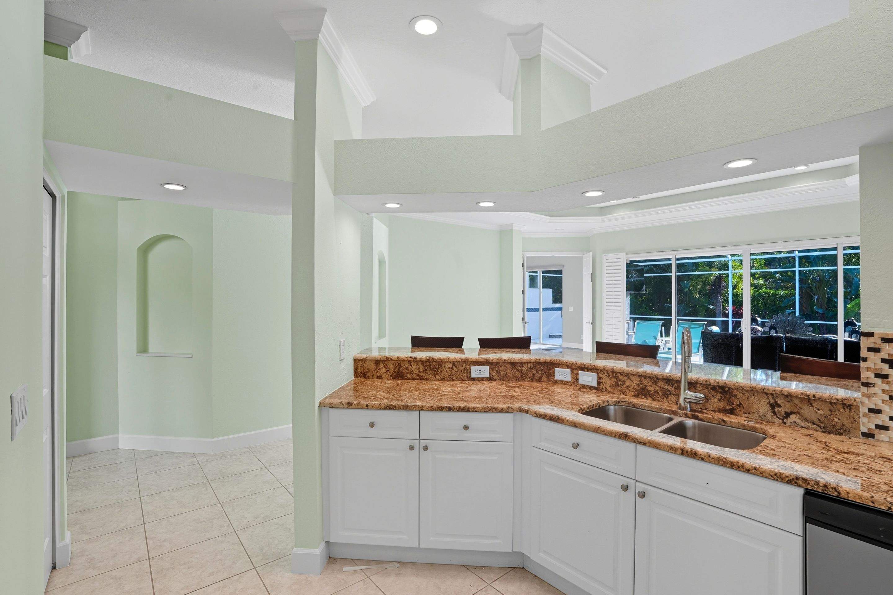 Complete Interior Renovation and Custom Cabinetry in Naples, Florida by A & E Construction of Florida Inc