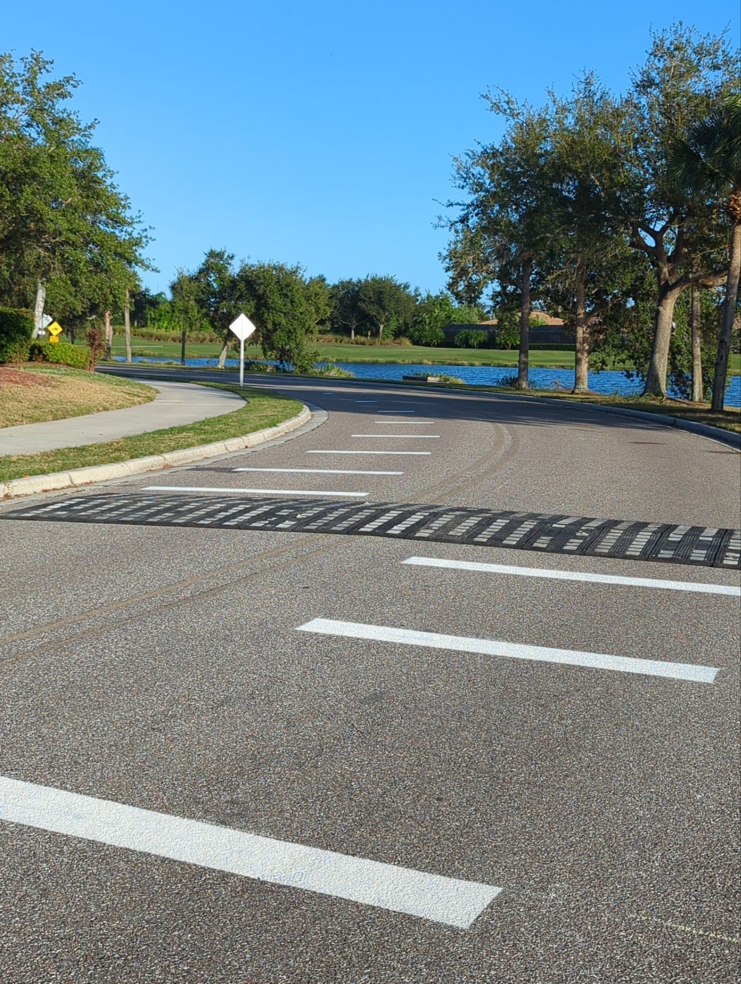 Speed Hump Installation by Everline Coatings & Services - Southwest FL