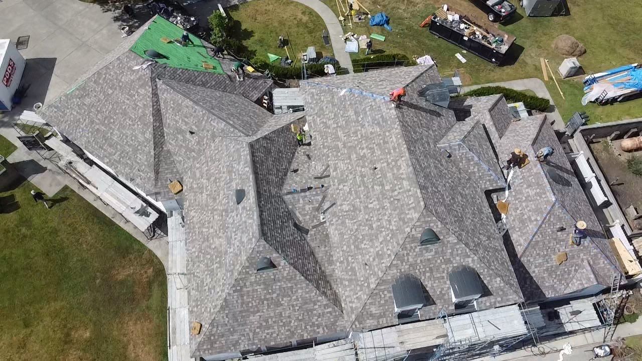 Residential Roof Installation with Hecker Clay Ridge Caps by CTL Pro Construction LLC