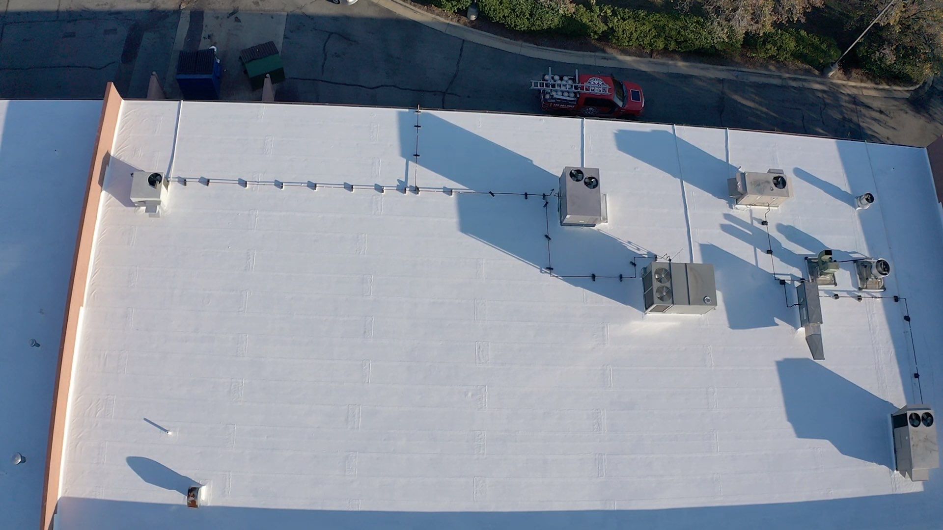 Commercial Coating using Poly Urerthane and Silicone Coating by Just In Time Roofing and Restoration