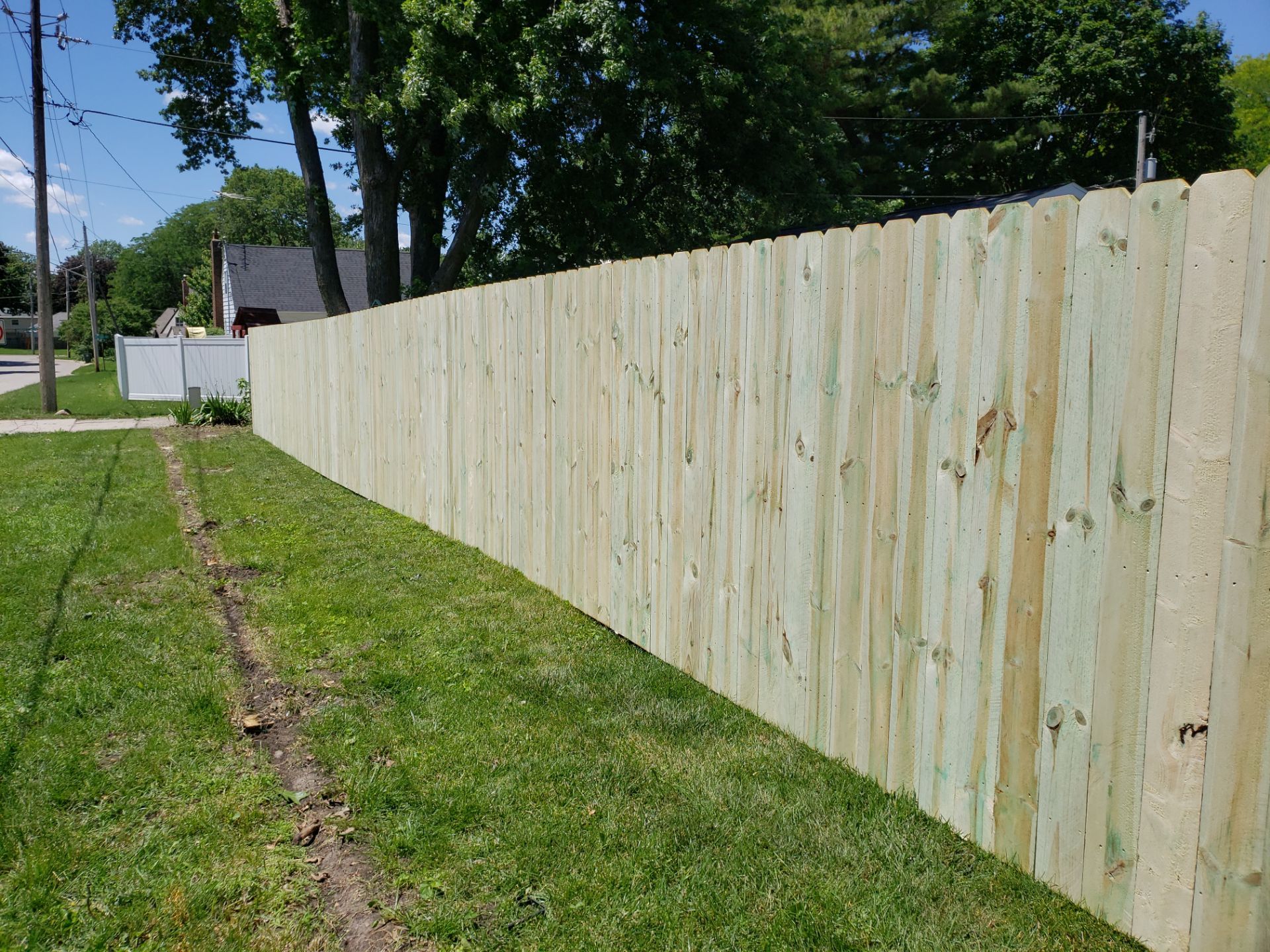 Pressure-Treated Pine Privacy Fence Replacement in Waterloo, Iowa by Perfect Picket Fence and Stain