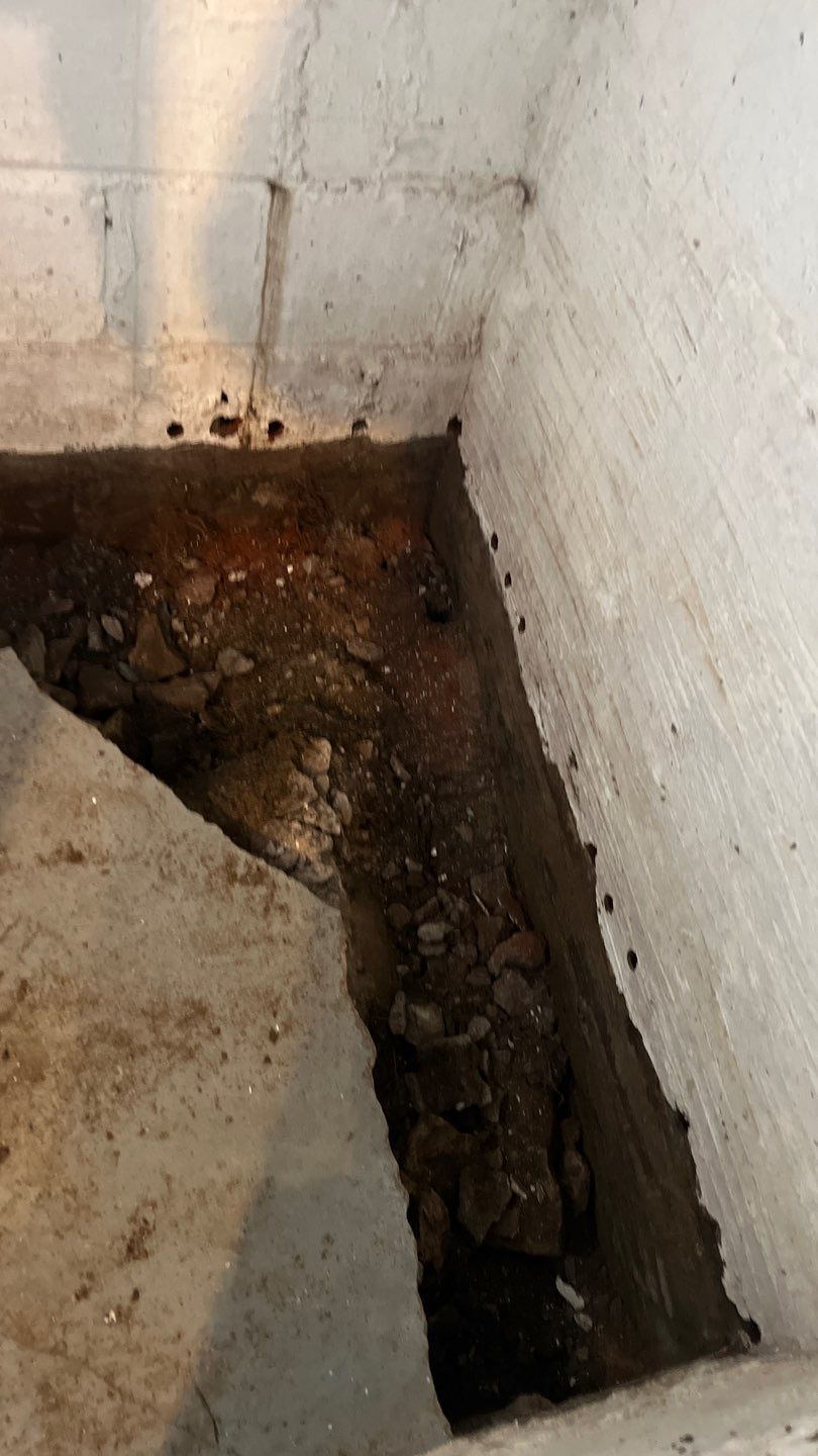 Basement Waterproofing using Drain tile system and a foundation wrap by ACE Waterproofing & Basement Solutions