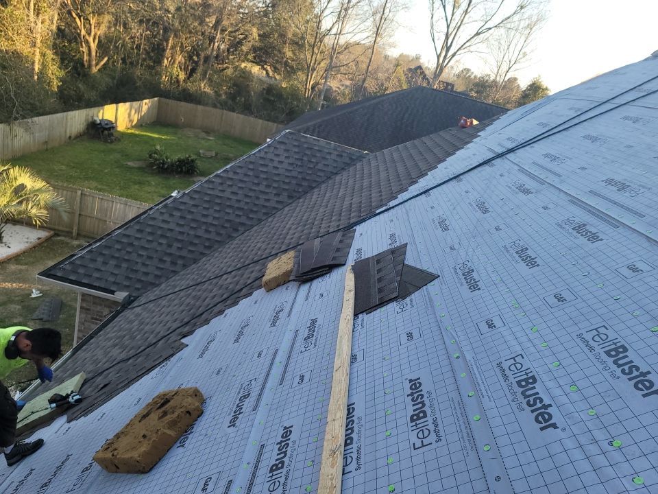 Residential Roofing Installation using Roof Replacement by American Roofing & Construction LLC