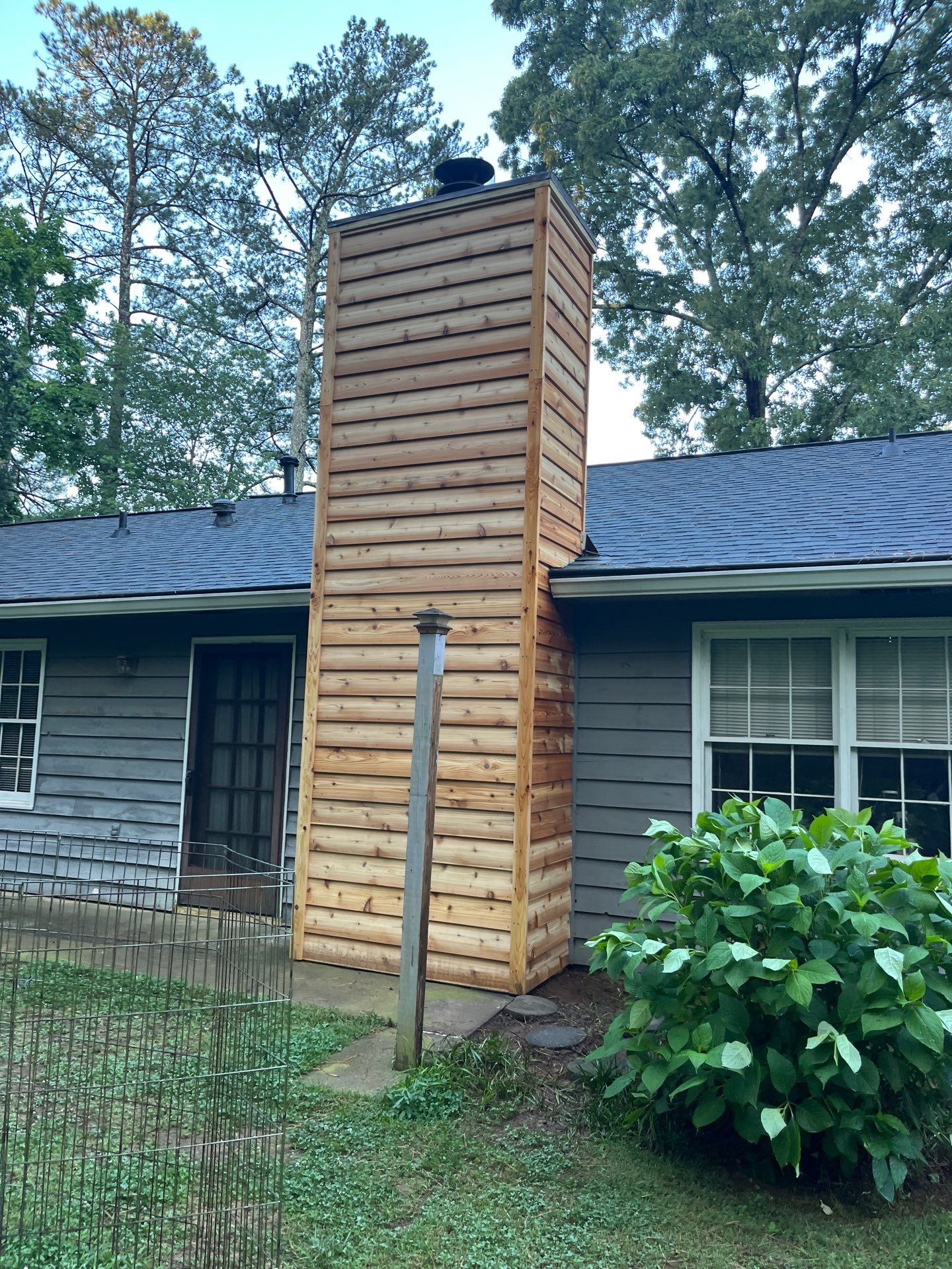 Marietta, GA Exterior Painting Transformation with Blue Paint by Nelson Exteriors