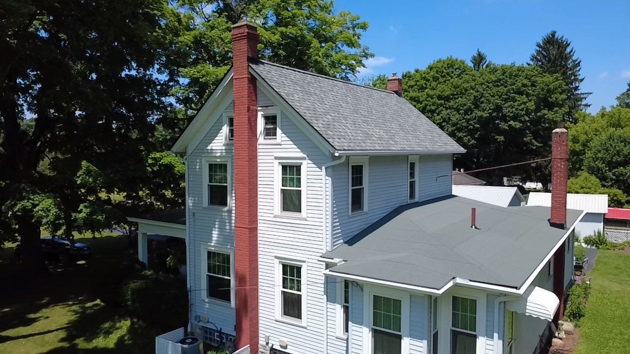 Complete Residential Shingle and Membrane Roof Installation in Salem by Eagle Eye Roofing