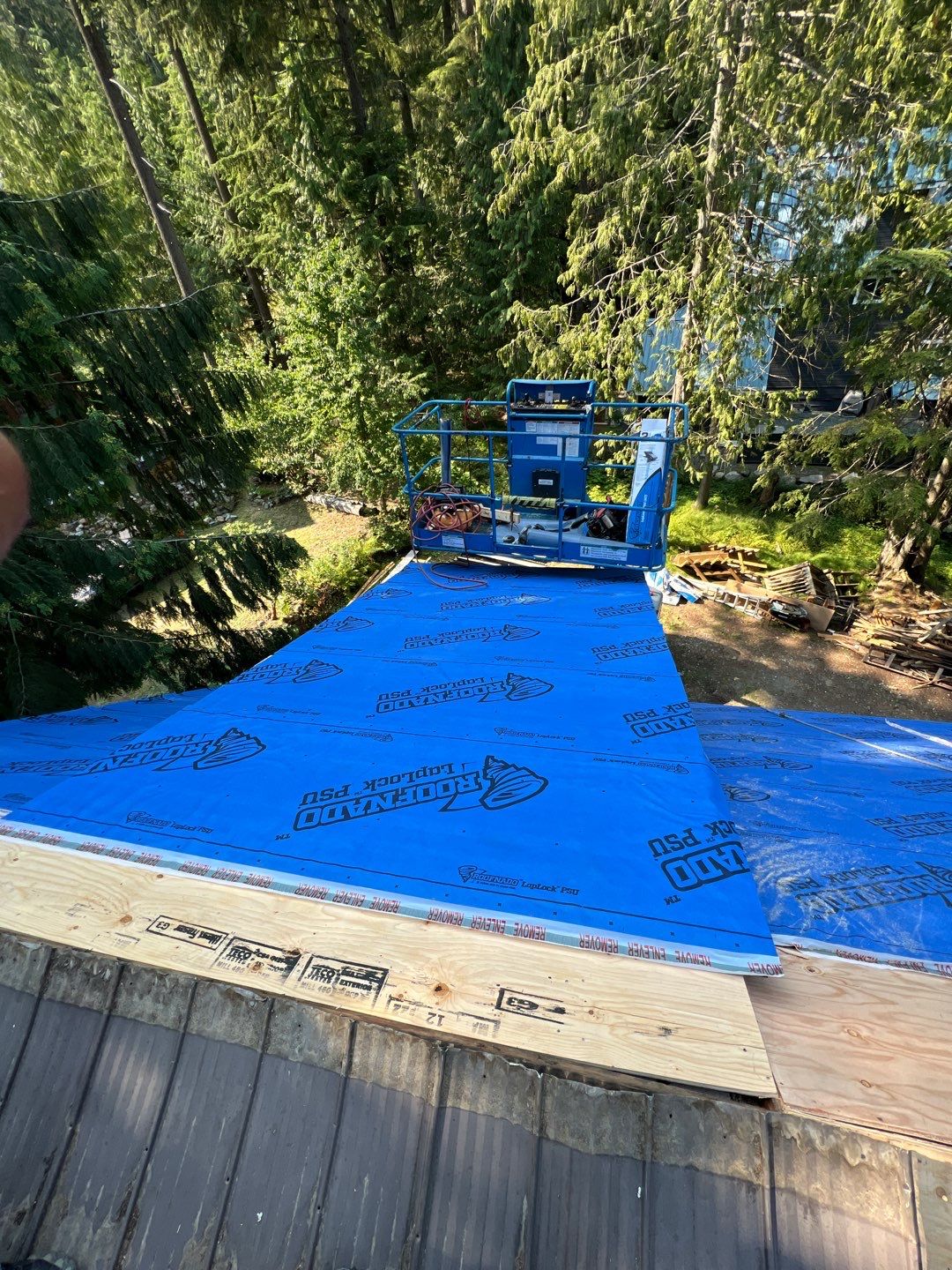 Residential ReRoofing Installation using 12" Prolok metal  by Top Notch Roofing Inc