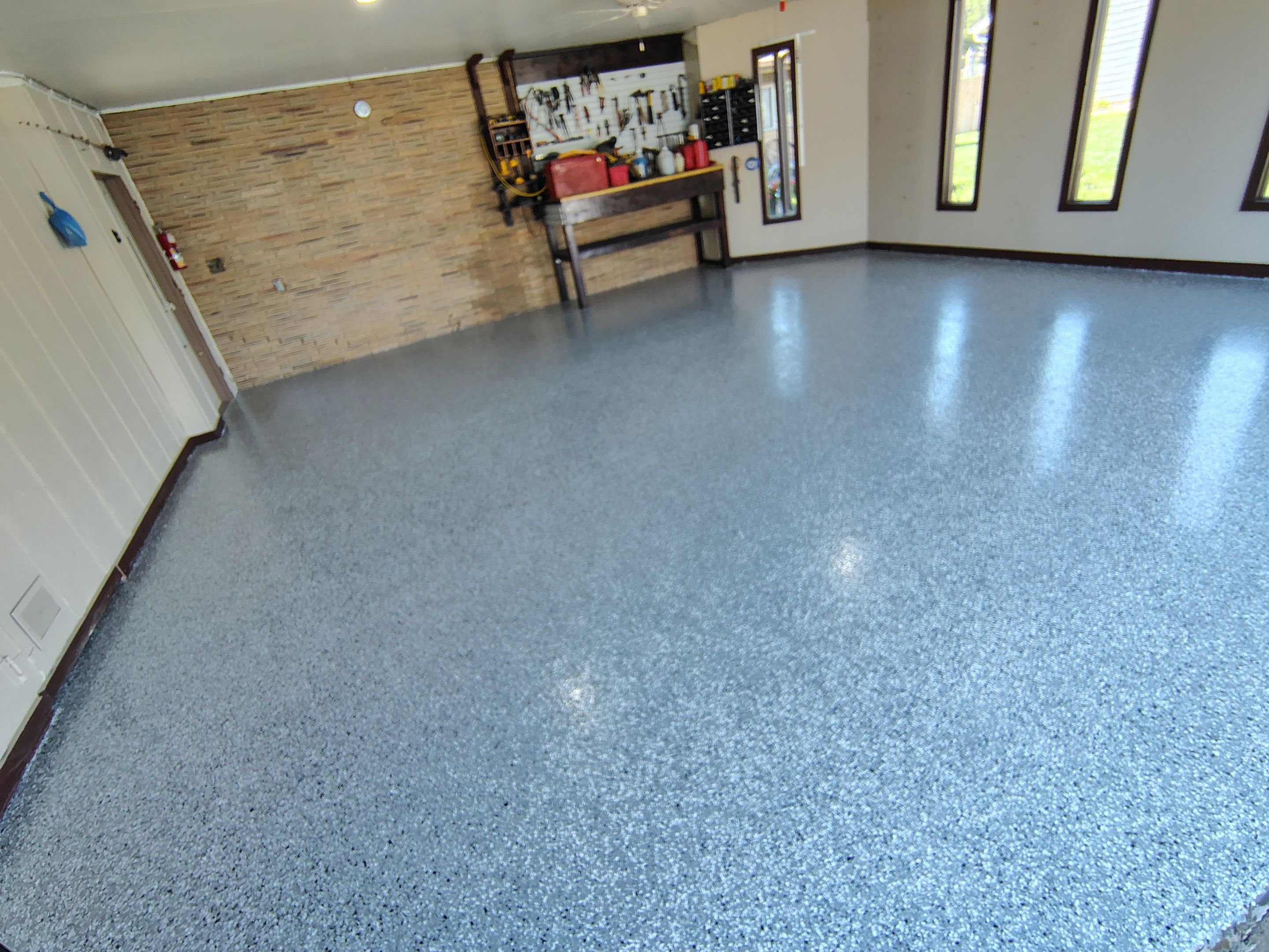Garage Floor Coating with Crack Repair in Yankton by Select Painting, Coatings & Garage Cabinets